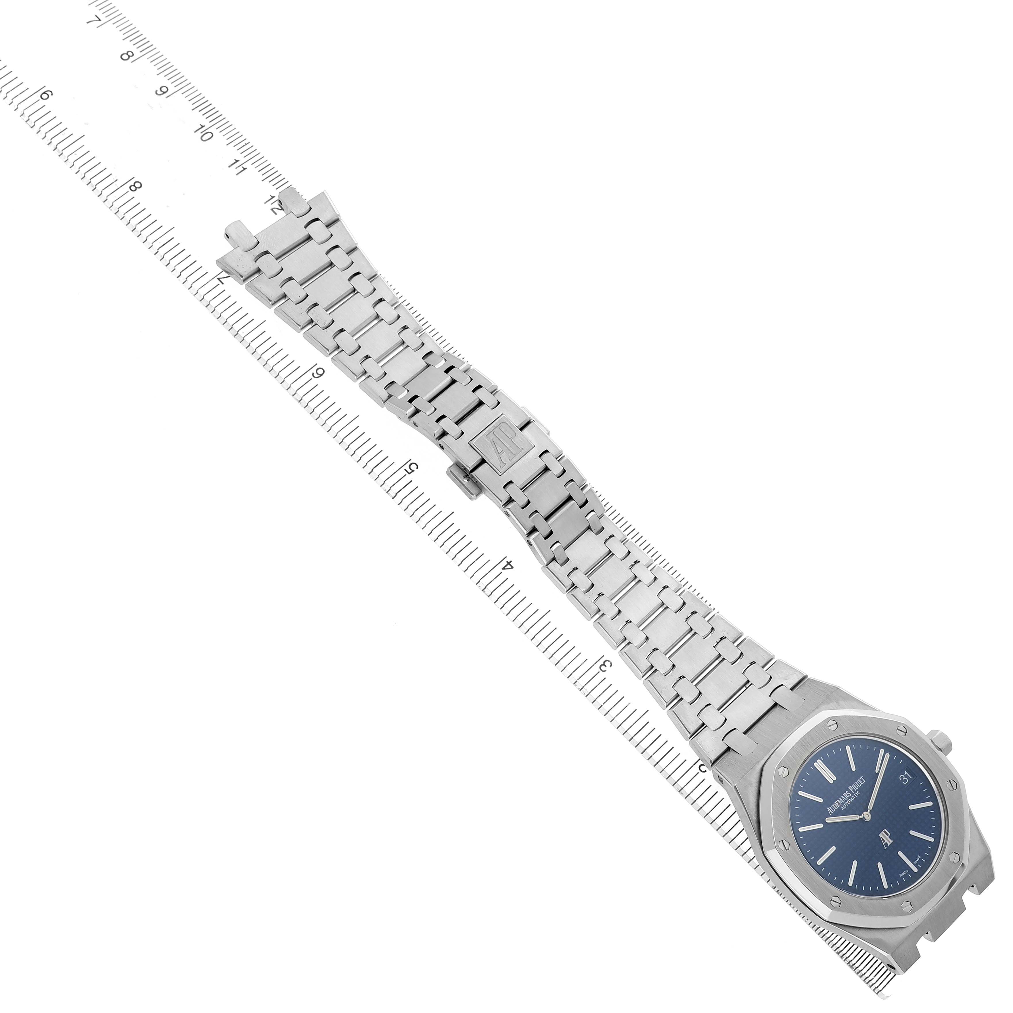 The Audemars Piguet Royal Oak 15202ST.OO.0944ST.02 Men's Stainless Steel Black Dial is shown at an angle, displaying the full watch face and bracelet against a ruler.