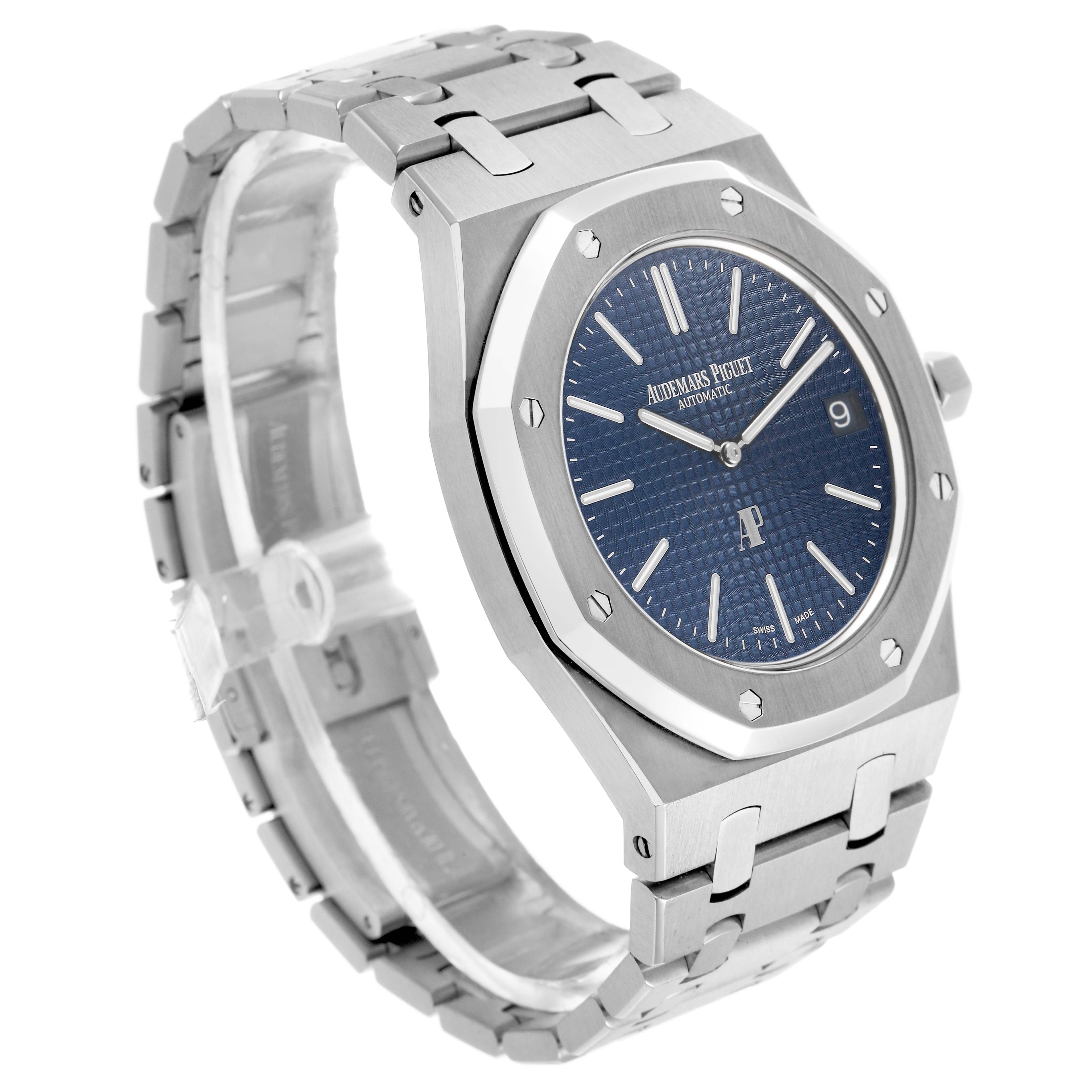 The Audemars Piguet Royal Oak 15202ST.OO.0944ST.02 Men's Stainless Steel Black Dial watch is shown at an angled side view, highlighting the case, bracelet, and blue dial.