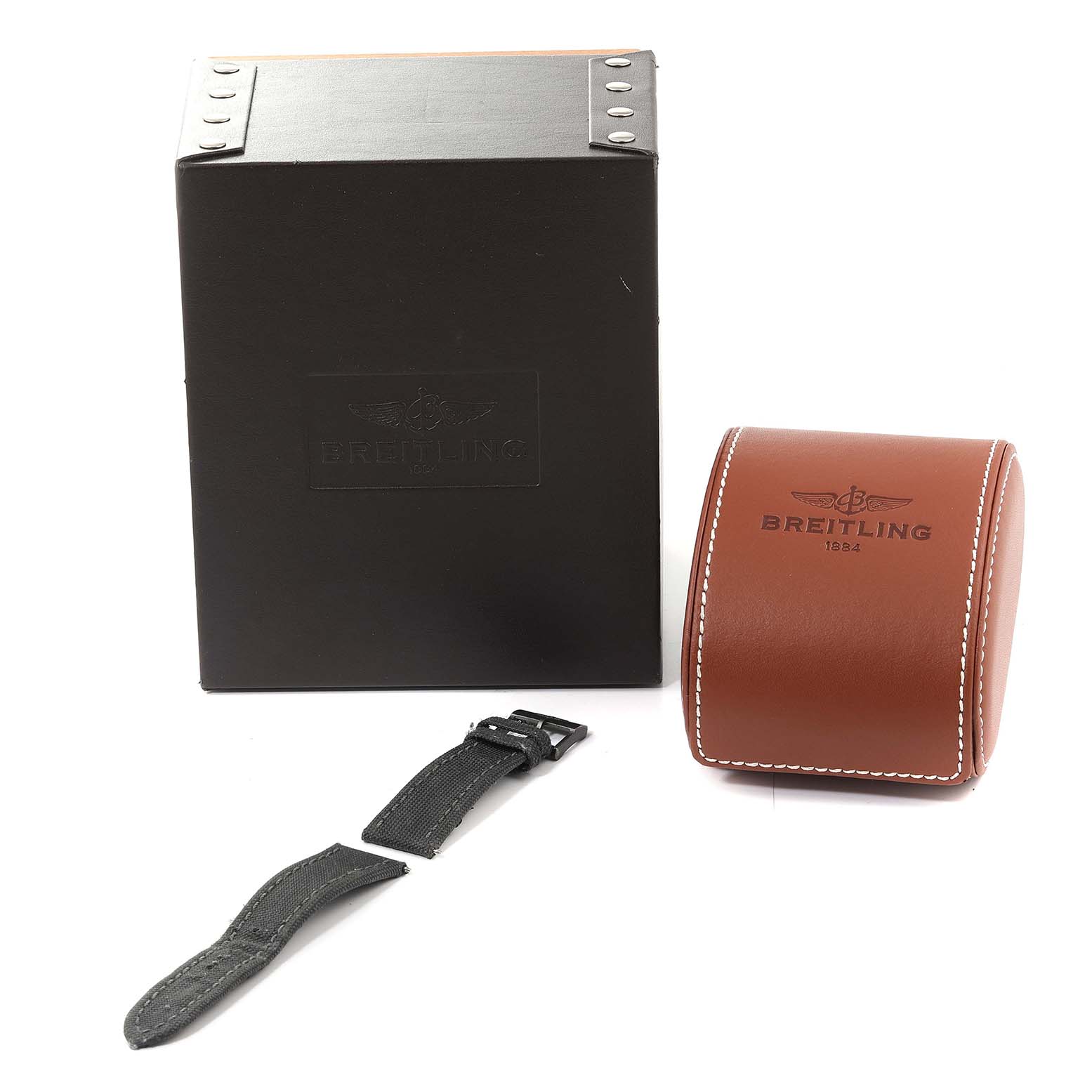 This image shows the packaging and leather strap of a Breitling Avenger V17310 Men's Titanium Black Dial V17310 Men's Titanium Black Dial watch.