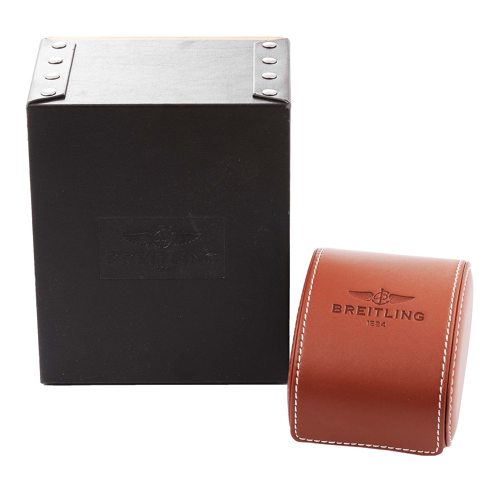 The image shows the packaging for a Breitling Avenger A13381 Men
s Stainless Steel White Dial A13381 Men
s Stainless Steel White Dial watch, including a black box and a brown leather case.