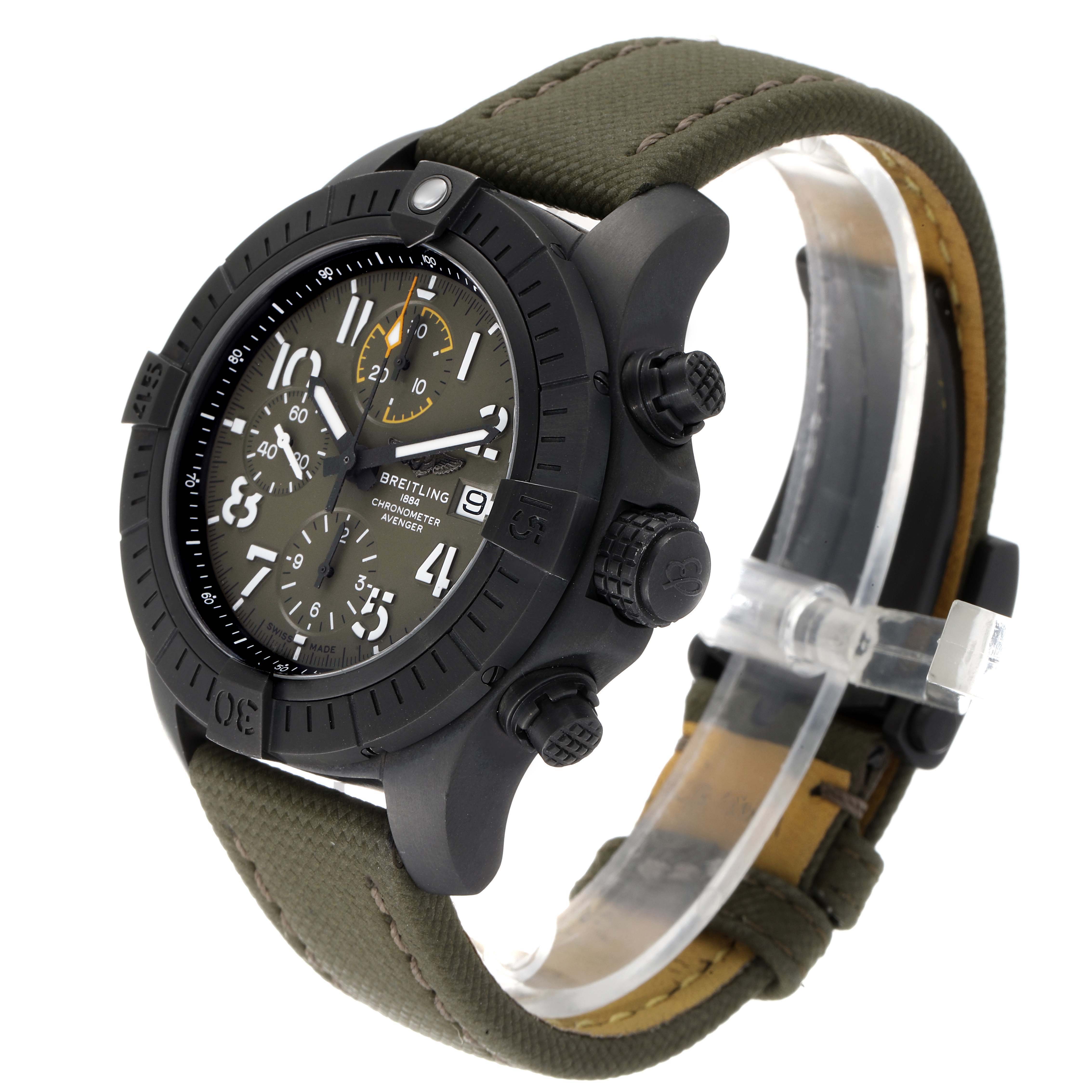 The Breitling Avenger V13317101L1X2 Men's Titanium Green Dial V13317101L1X2 Men's Titanium Green Dial watch is shown at a three-quarter angle, highlighting its black bezel, dial, and khaki fabric strap.