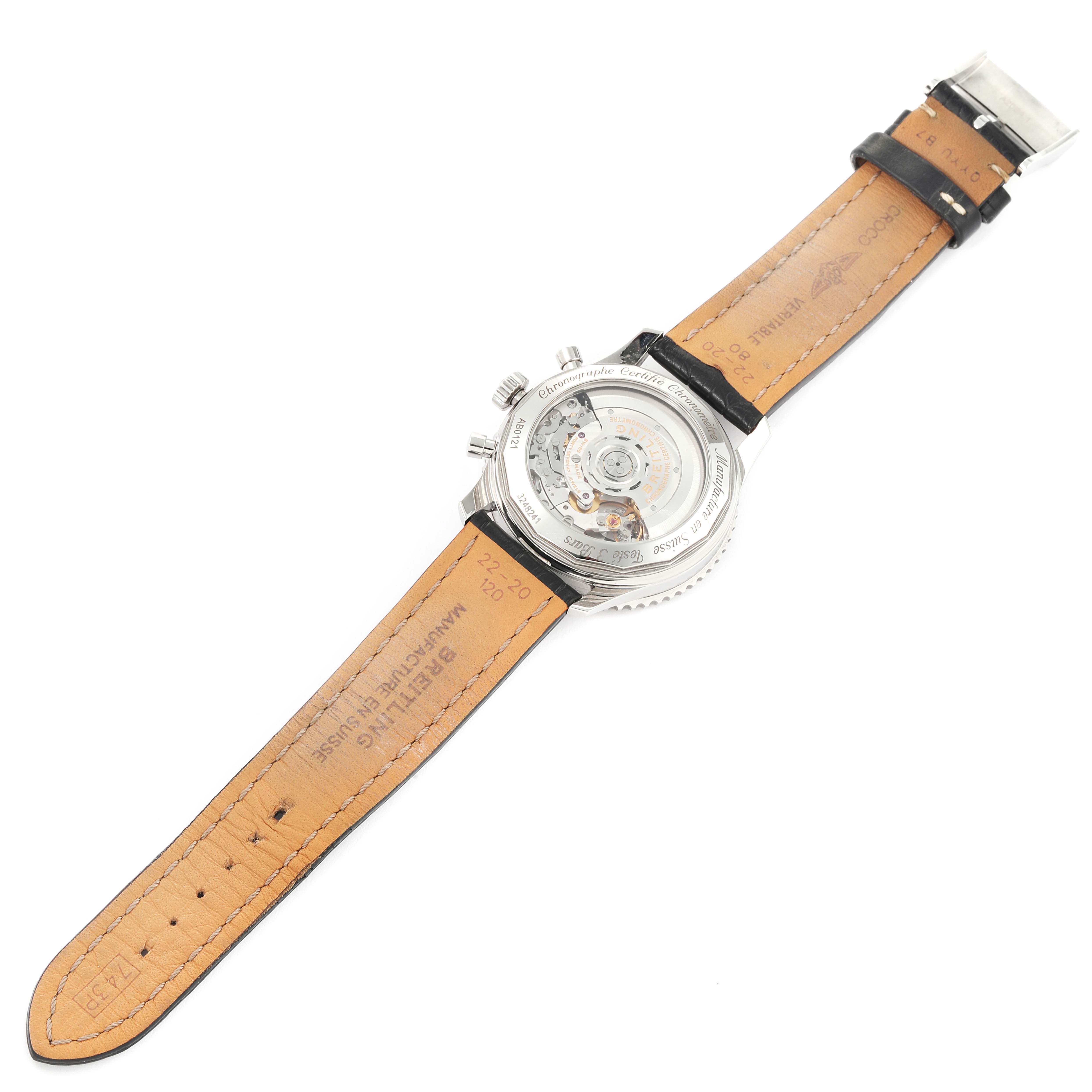 The image shows the backside and inner mechanism of a Breitling Navitimer AB0121C4-C920-731P Men's Stainless Steel Blue Dial AB0121C4-C920-731P Men's Stainless Steel Blue Dial watch with the leather strap fully extended.