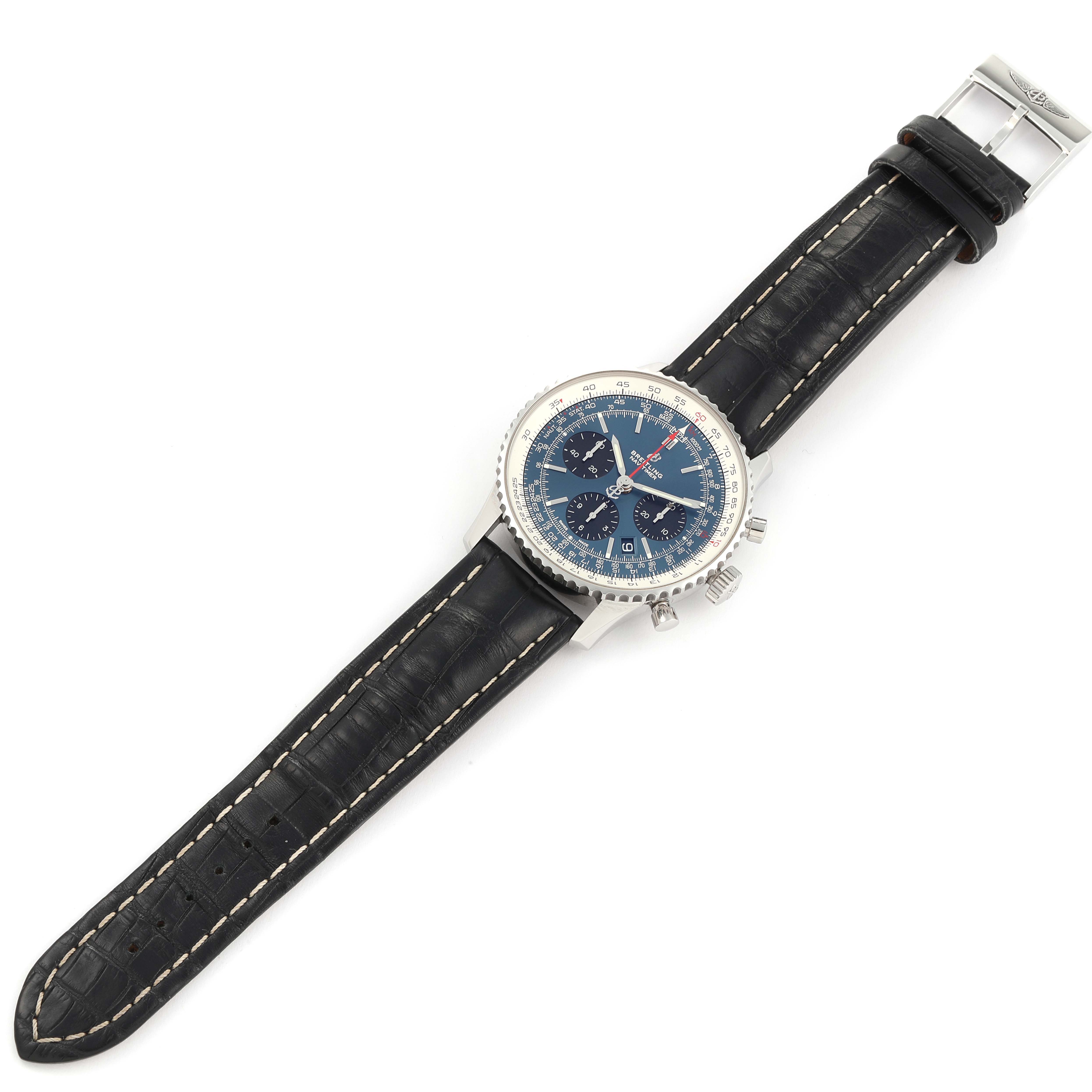This image shows a Breitling Navitimer AB0121C4-C920-731P Men's Stainless Steel Blue Dial AB0121C4-C920-731P Men's Stainless Steel Blue Dial watch from an overhead angle, displaying its dial, bezel, leather strap, and buckle.