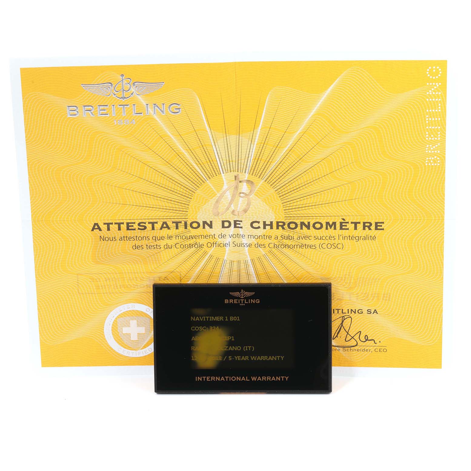 The image shows Breitling Navitimer AB0121C4-C920-731P Men's Stainless Steel Blue Dial AB0121C4-C920-731P Men's Stainless Steel Blue Dial warranty and chronometer attestation cards.