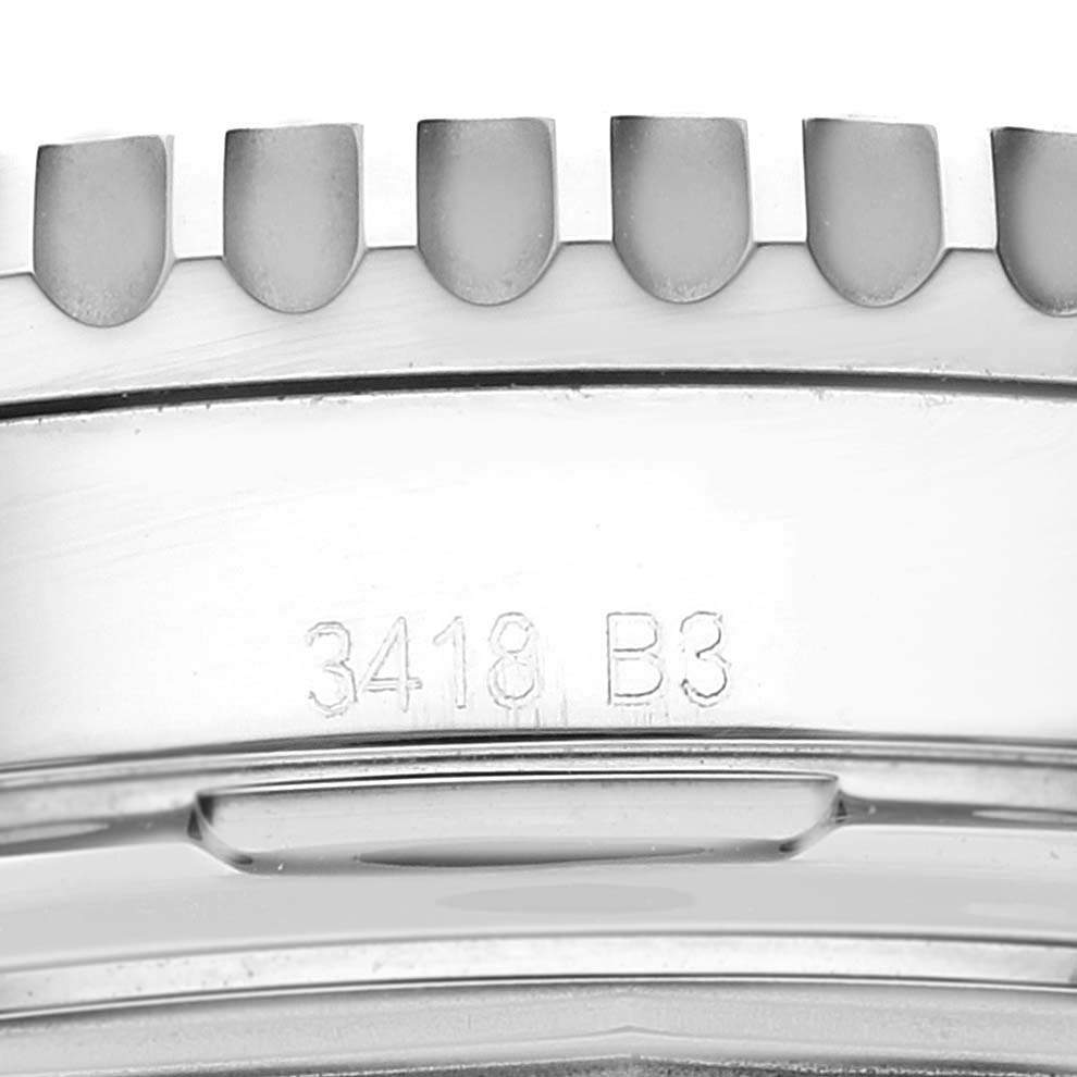 The image shows a close-up of the bezel and engraved serial number on a Breitling Navitimer AB0121C4-C920-731P Men's Stainless Steel Blue Dial AB0121C4-C920-731P Men's Stainless Steel Blue Dial watch.