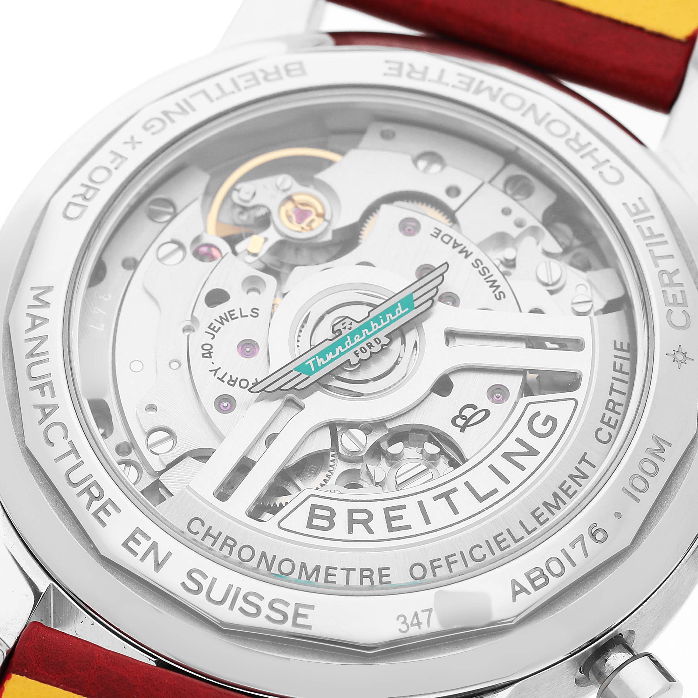 The image shows the back view of the Breitling Premier AB01766A1A1X1 Men's Stainless Steel White Dial watch, displaying its intricate Swiss movement and rotor details.