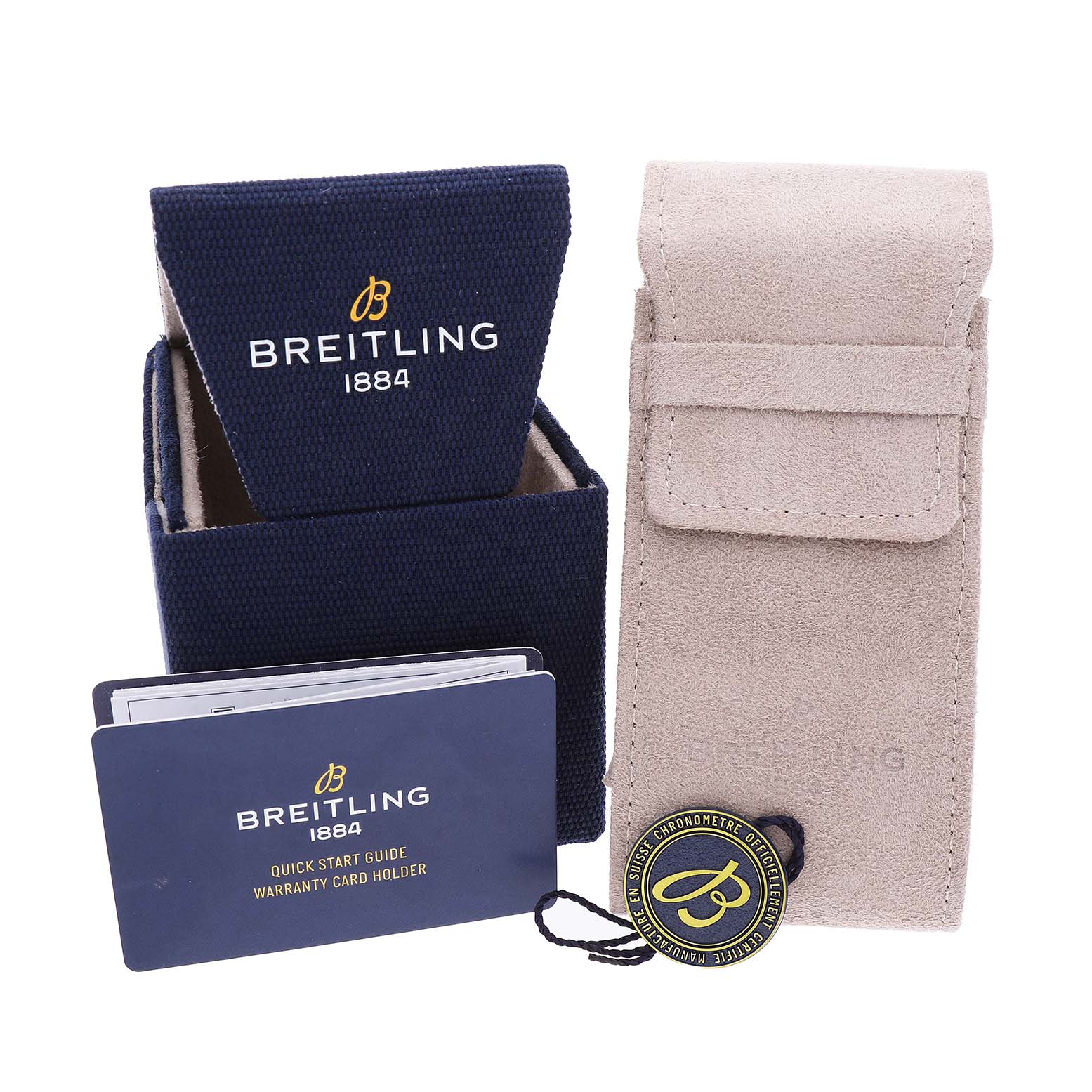 The Breitling Premier AB01766A1A1X1 Men's Stainless Steel White Dial watch accessories include a box, a pouch, a warranty card holder, and a tag, all viewed from the side.