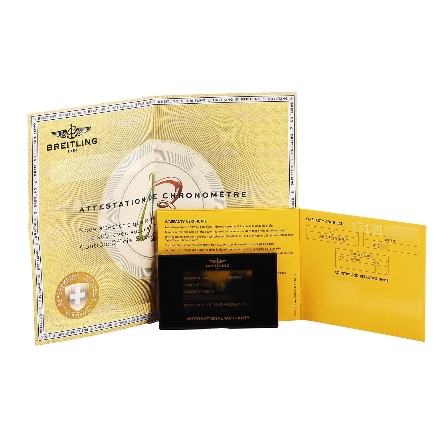 The image shows warranty documents and certification for the Breitling Transocean AB0510 Men's Stainless Steel Black Dial watch model.