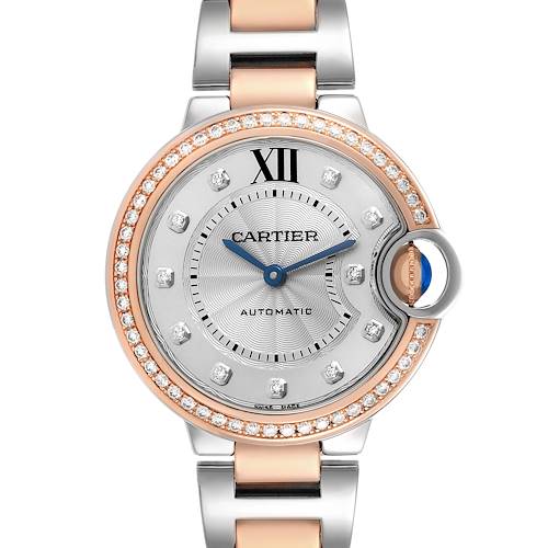 The Cartier Ballon Bleu WE902077 Women's Steel and Gold (two tone) Silver Dial watch is shown from the front, highlighting its silver dial, diamond indices, rose gold bezel, and bracelet.