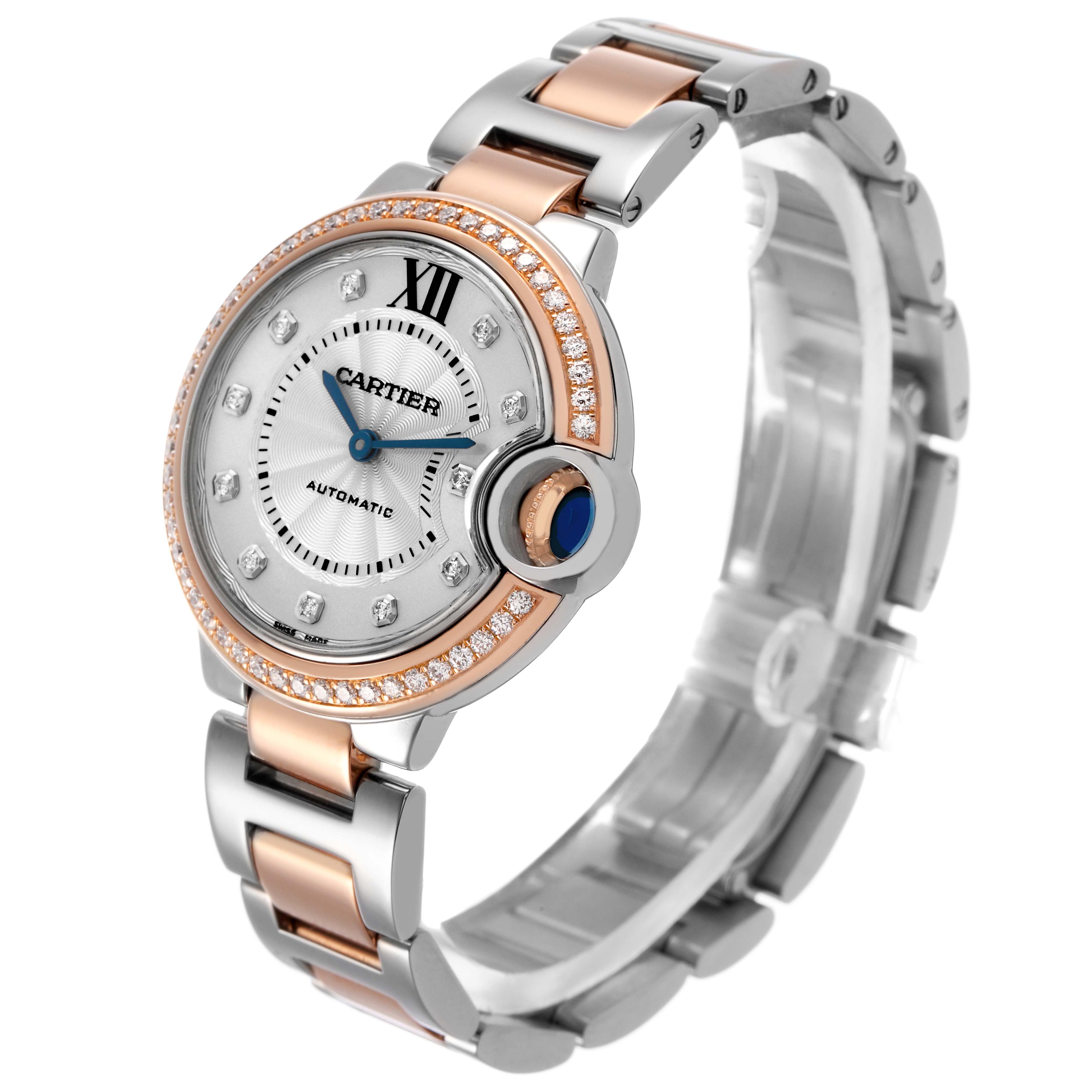 The Ballon Bleu de Cartier watch is shown from a side angle, highlighting its circular face, diamond bezel, and mixed metal bracelet.
