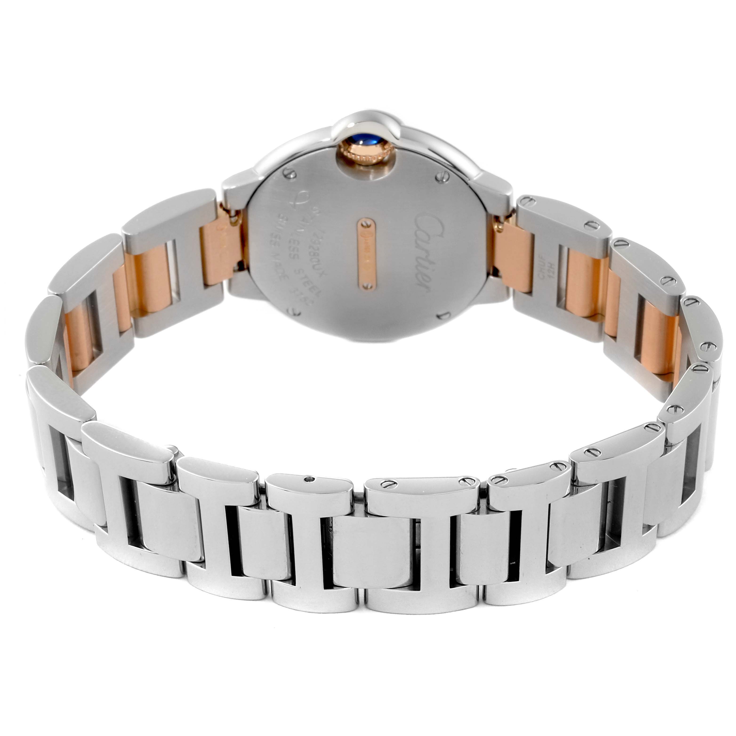 The image shows the back of the Ballon Bleu model by Cartier, focusing on the bracelet and case back.