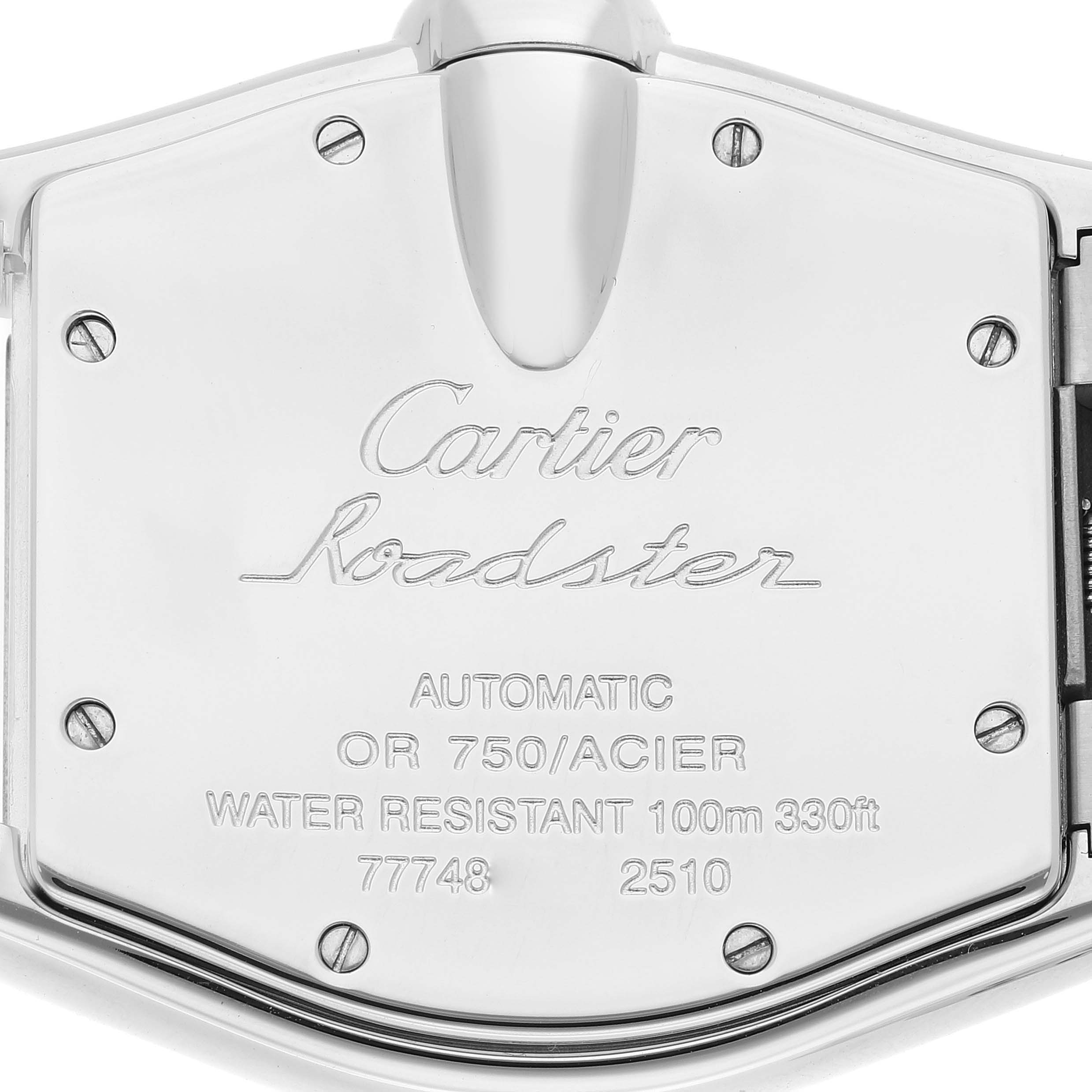 This image showcases the back case of the Cartier Roadster W62031Y4 Men
s Steel and Gold (two tone) Silver Dial W62031Y4 Men
s Steel and Gold (two tone) Silver Dial watch, highlighting the engraved details and screws.