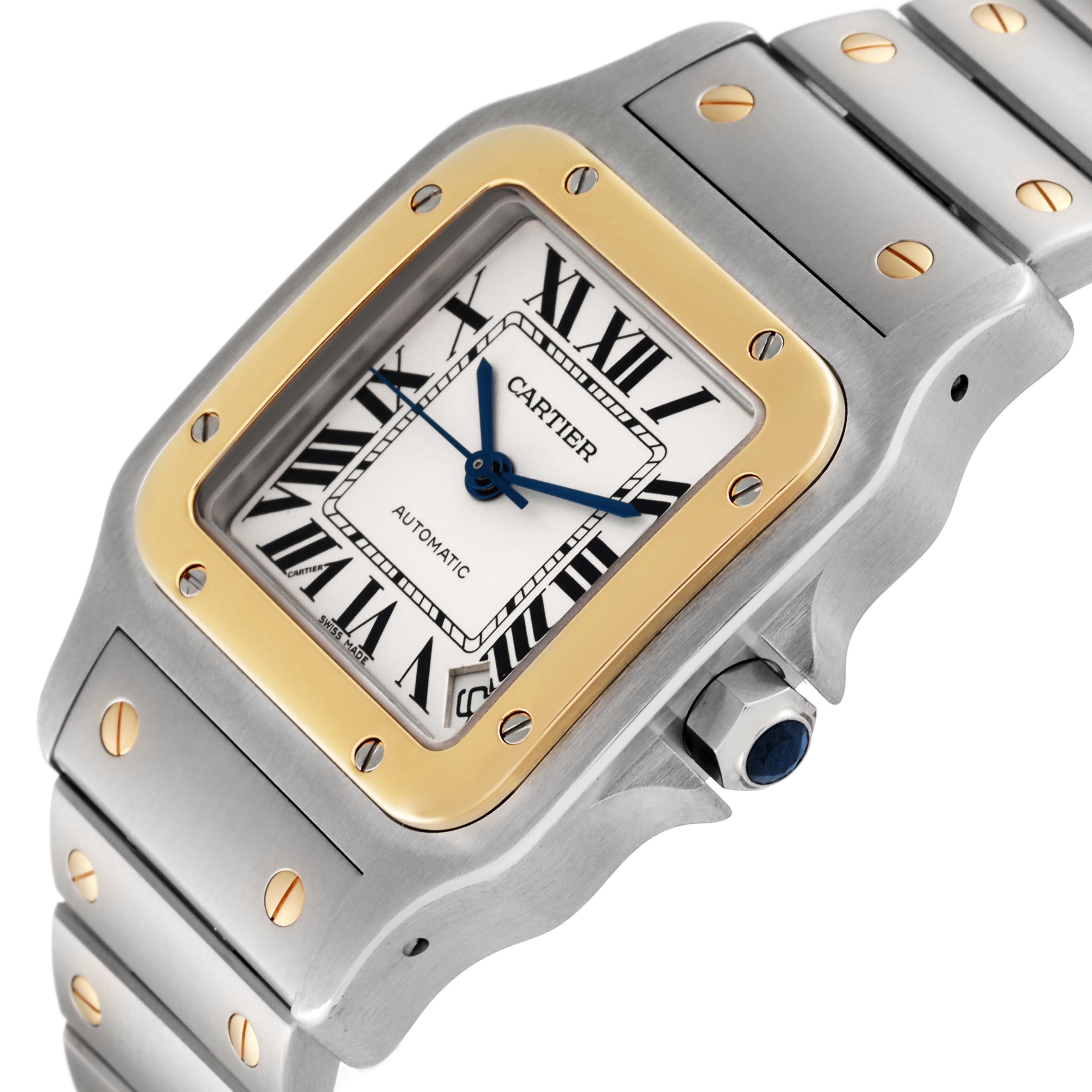 The image shows a close-up of the Cartier Santos W20099C4 Men
s Steel and Gold (two tone) Silver Dial W20099C4 Men
s Steel and Gold (two tone) Silver Dial watch, highlighting the dial, bezel, and part of the bracelet.