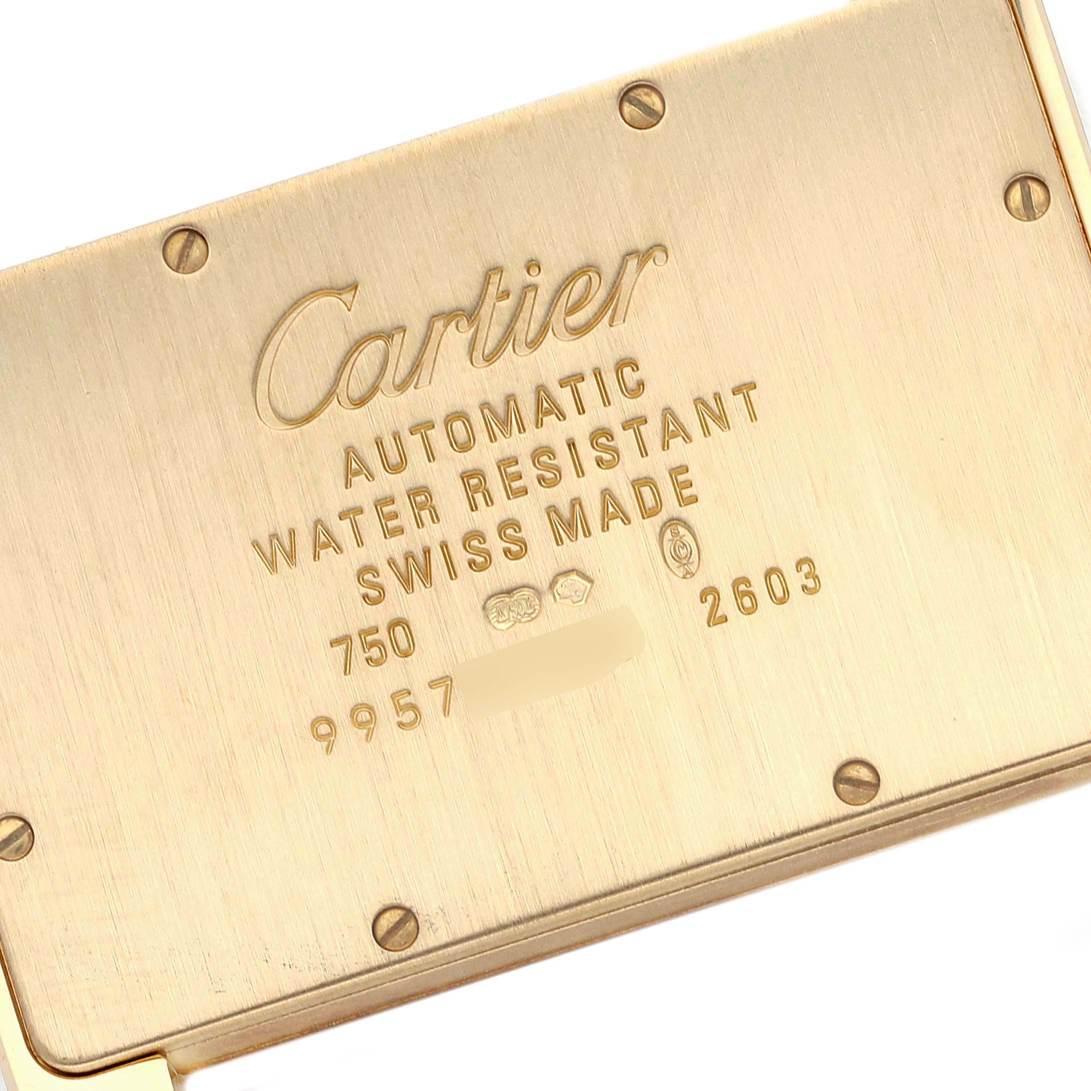 This is the back view of a Cartier Tank Divan W6300856‏ Women's Yellow Gold Silver Dial W6300856‏ Women's Yellow Gold Silver Dial watch, showing engravings and screws.