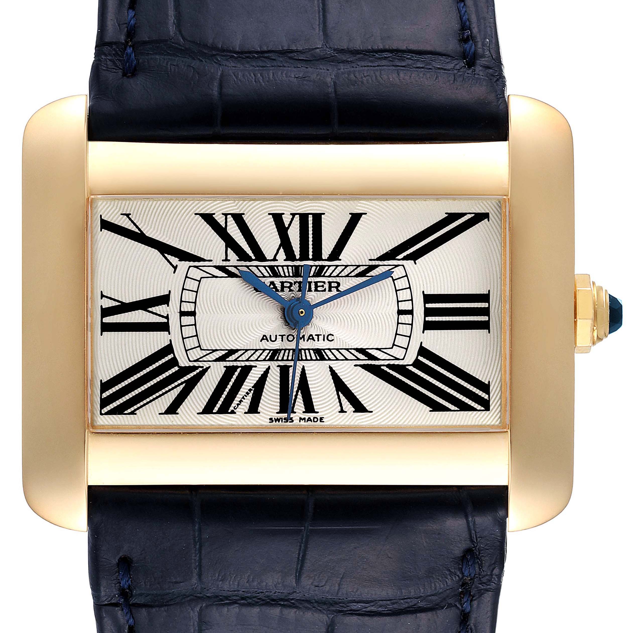 This image shows a frontal view of the Cartier Tank Divan W6300856‏ Women's Yellow Gold Silver Dial W6300856‏ Women's Yellow Gold Silver Dial watch, highlighting its face, bezel, and part of the strap.