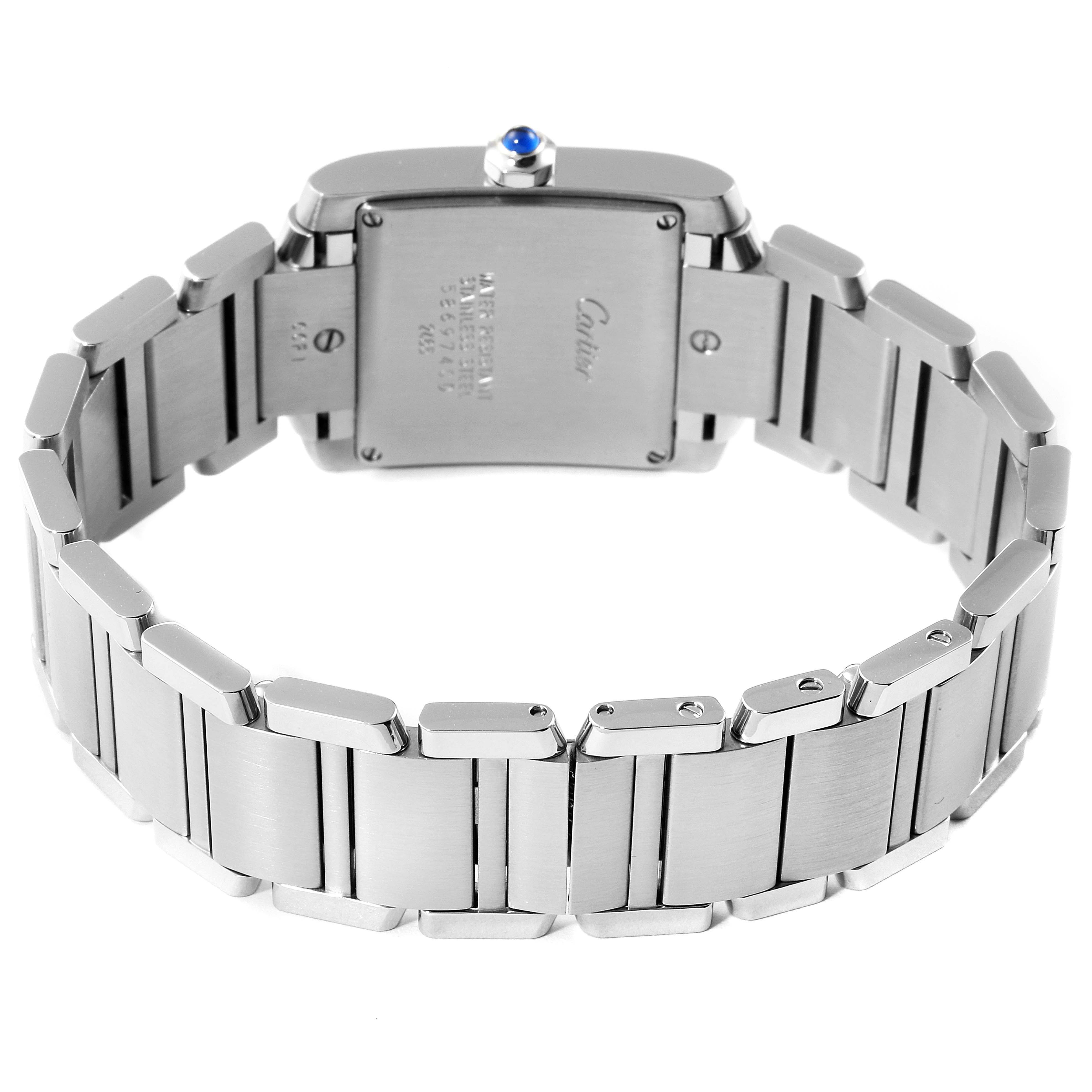 The image shows the backside and bracelet of a Cartier Tank Française watch.