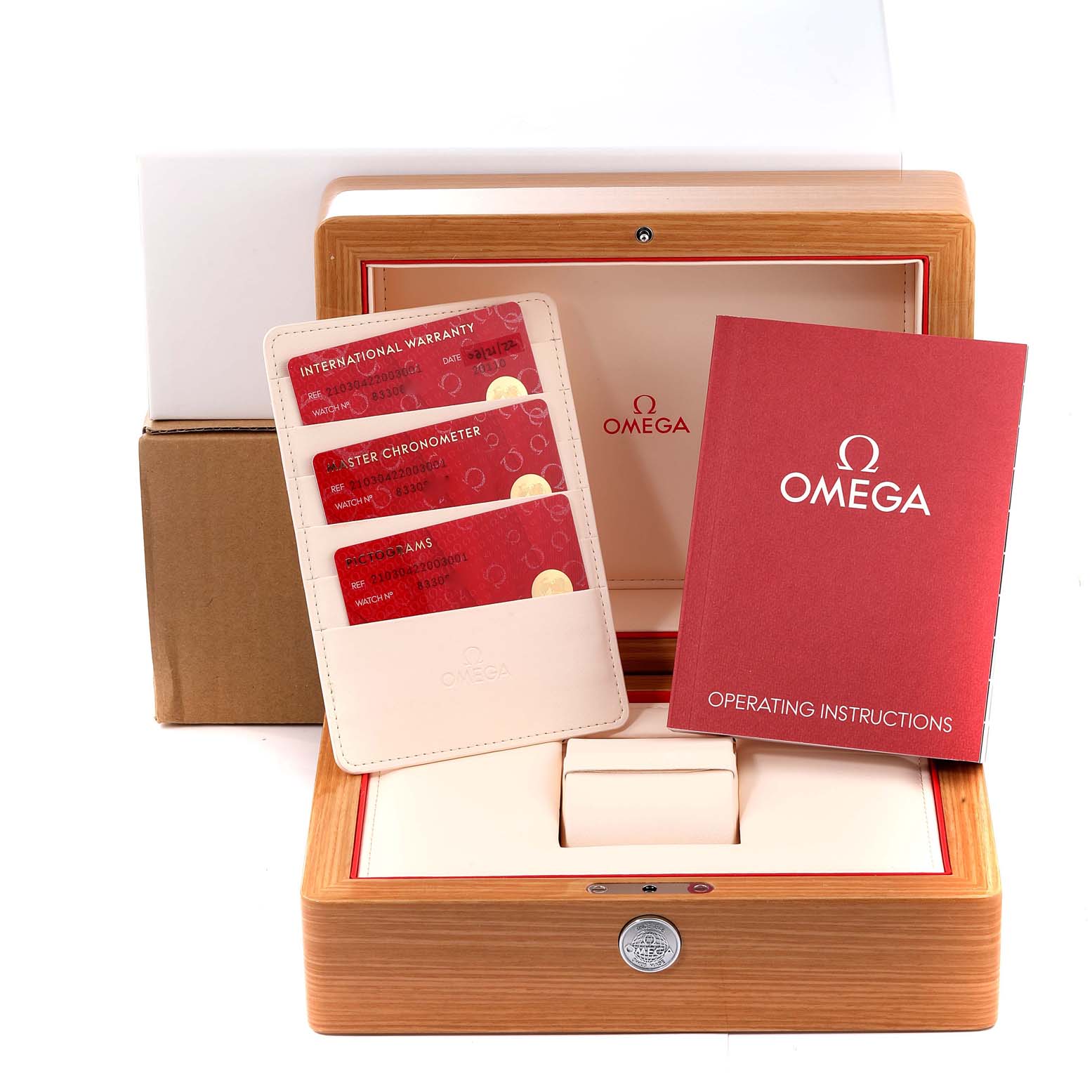 The image displays the packaging and accessories of the Omega Seamaster 210.30.42.20.03.001 Men's Stainless Steel Blue Dial 210.30.42.20.03.001 Men's Stainless Steel Blue Dial, including the box, warranty cards, and operating instructions.