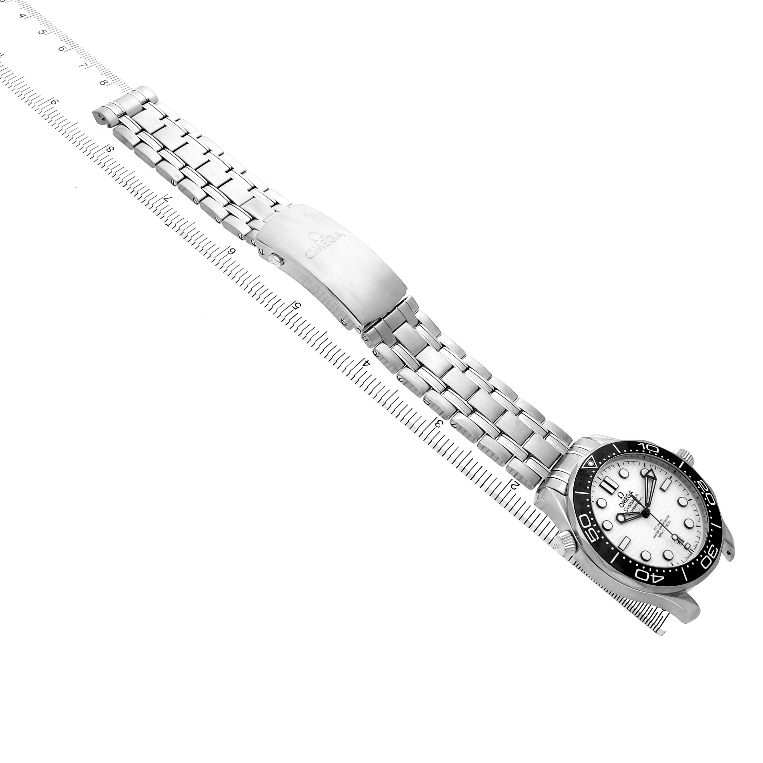 The Omega Seamaster 210.30.42.20.04.001 Men's Stainless Steel White Dial watch is shown from an angled top view, highlighting the face, bezel, and metal bracelet with clasp.