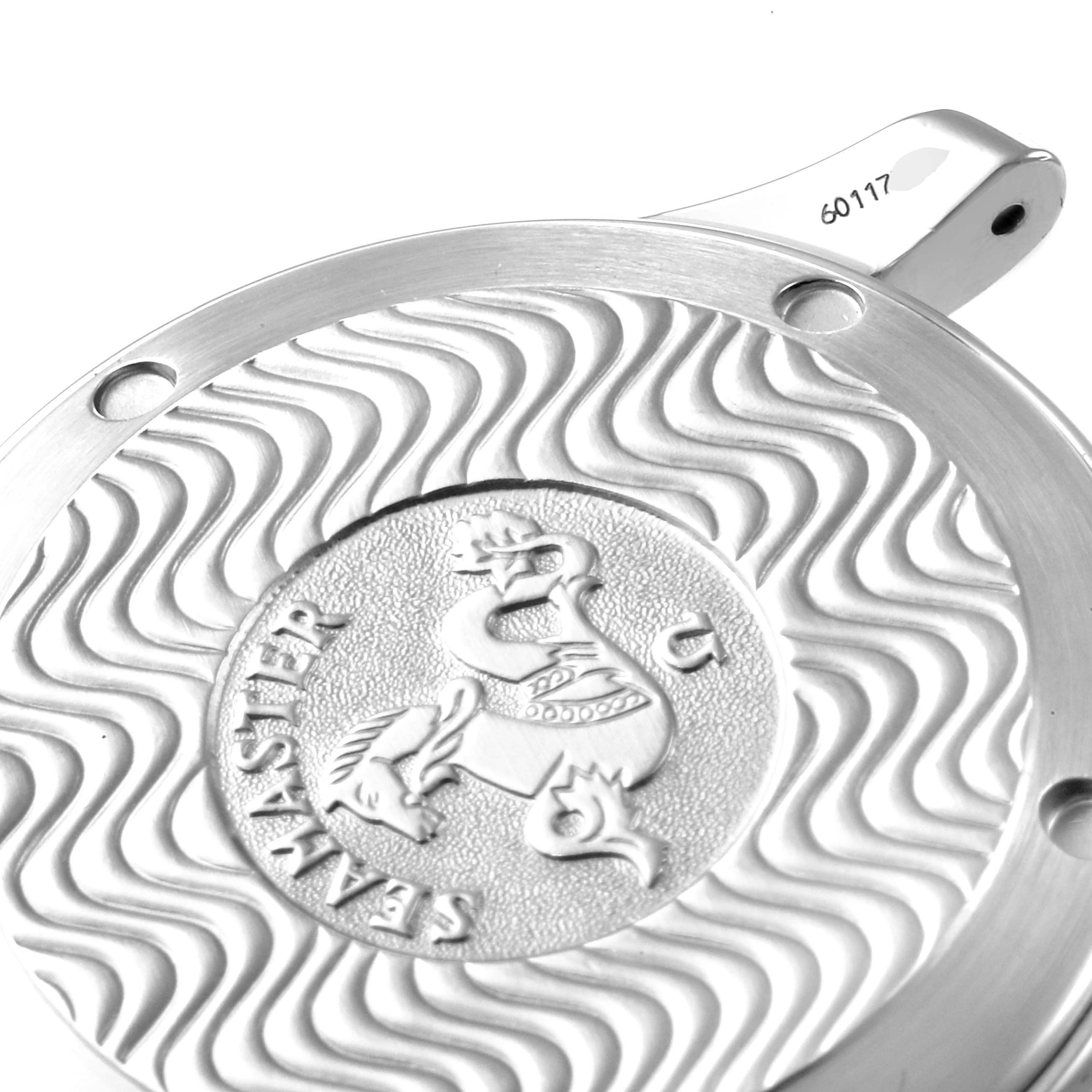 Close-up angle of the Omega Seamaster 2551.80.00 Men's Stainless Steel Blue Dial 2551.80.00 Men's Stainless Steel Blue Dial watch case back, highlighting the wavy texture and engraved emblem.