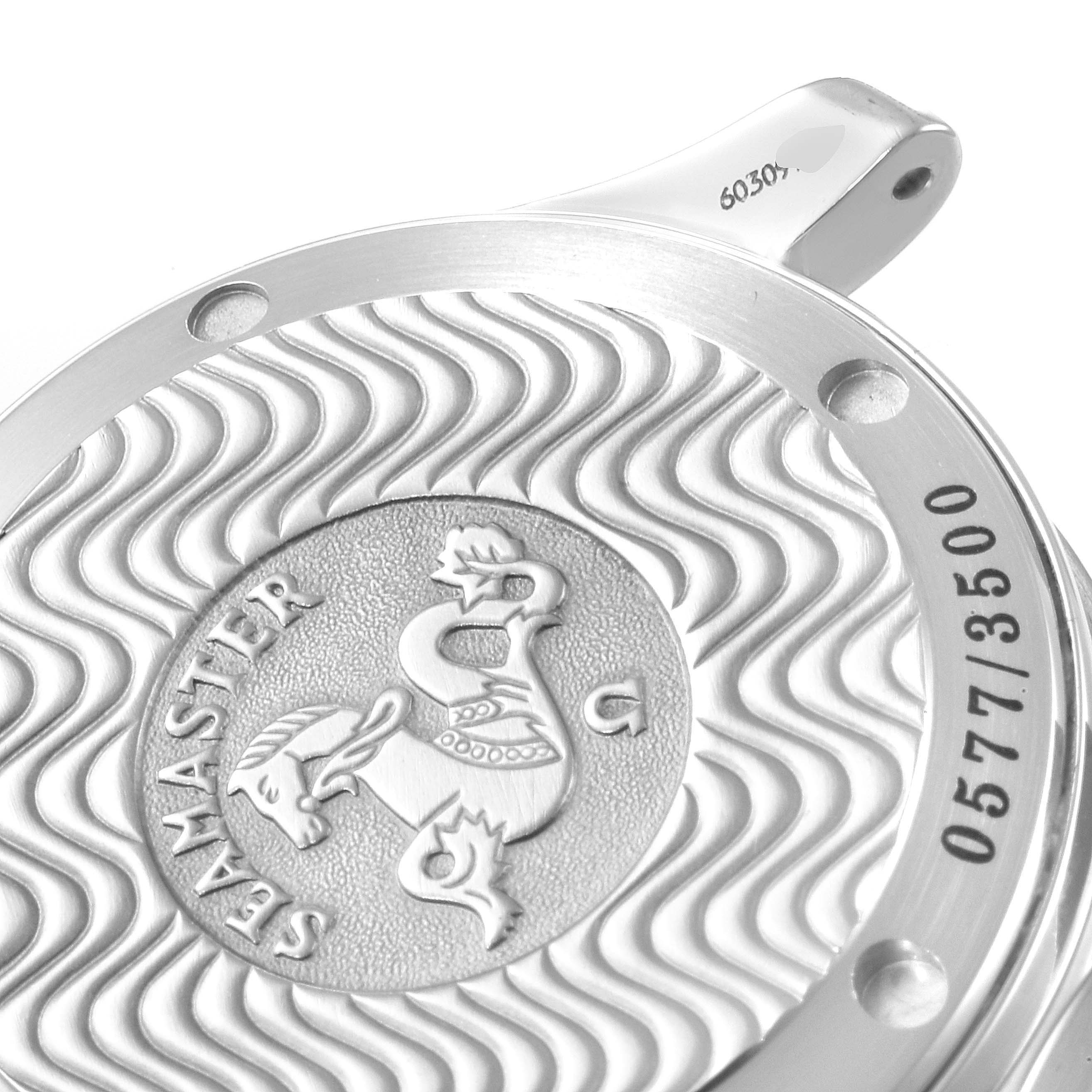 This close-up image shows the case back of an Omega Seamaster 2554.80.00 Men's Stainless Steel Blue Dial 2554.80.00 Men's Stainless Steel Blue Dial watch, featuring its wavy pattern and engraved emblem.