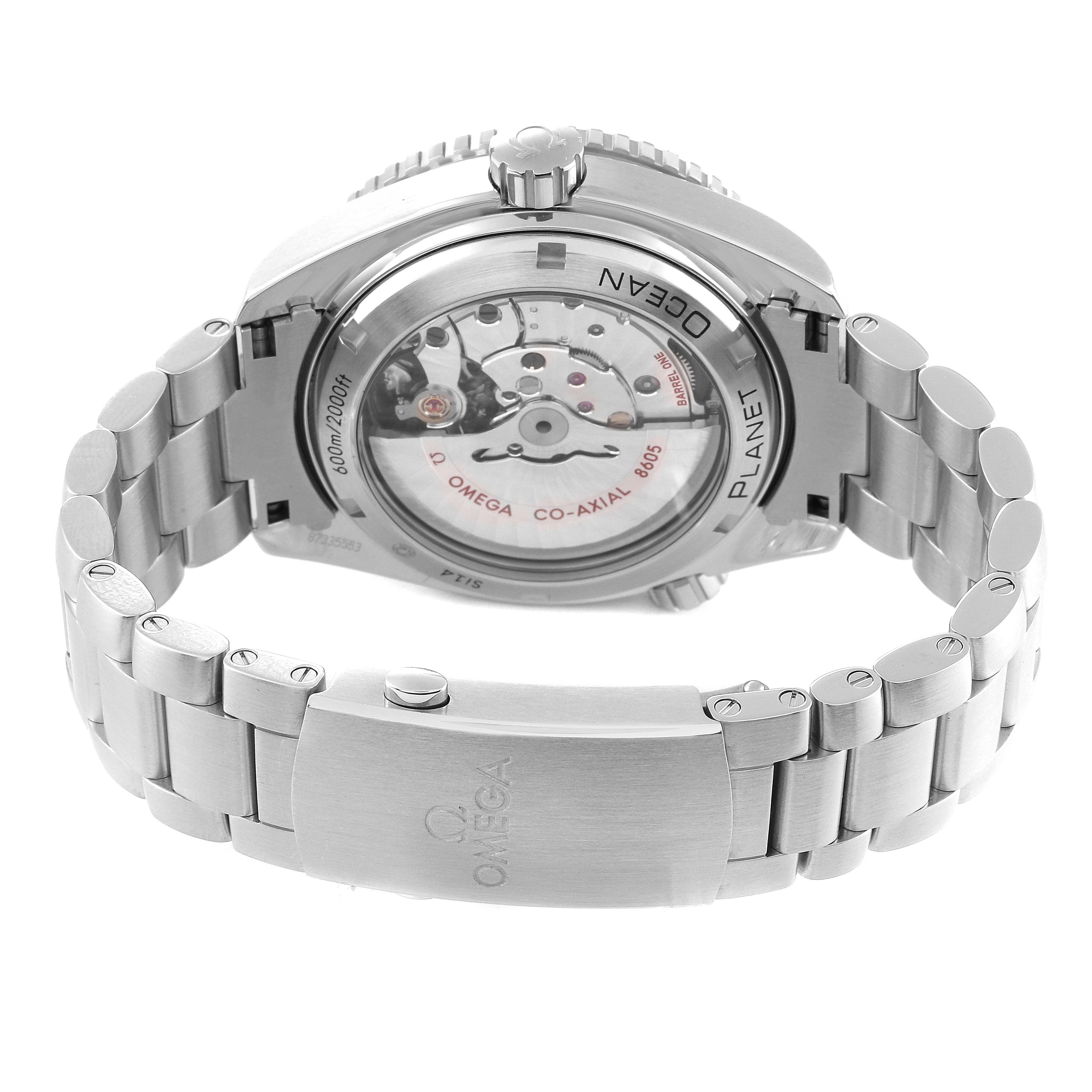 The image shows the case back and bracelet of the Omega Planet Ocean 232.30.44.22.01.002 Men's Stainless Steel Black Dial 232.30.44.22.01.002 Men's Stainless Steel Black Dial watch, highlighting the movement and rotor.