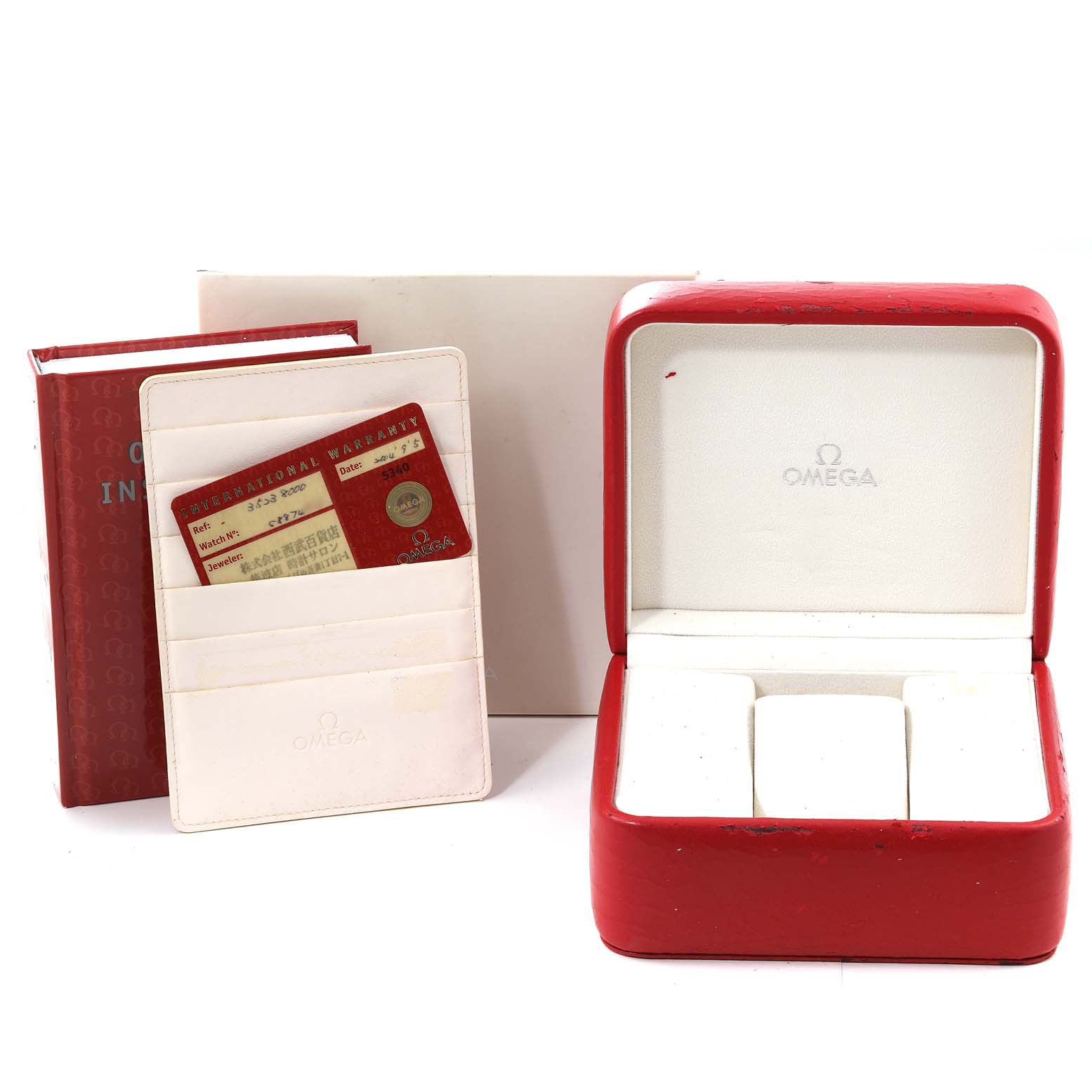 The image shows the Omega Speedmaster 3523.80.00 Men
s Stainless Steel Blue Dial 3523.80.00 Men
s Stainless Steel Blue Dial watch box, warranty cards, and instruction manual, viewed from the front.