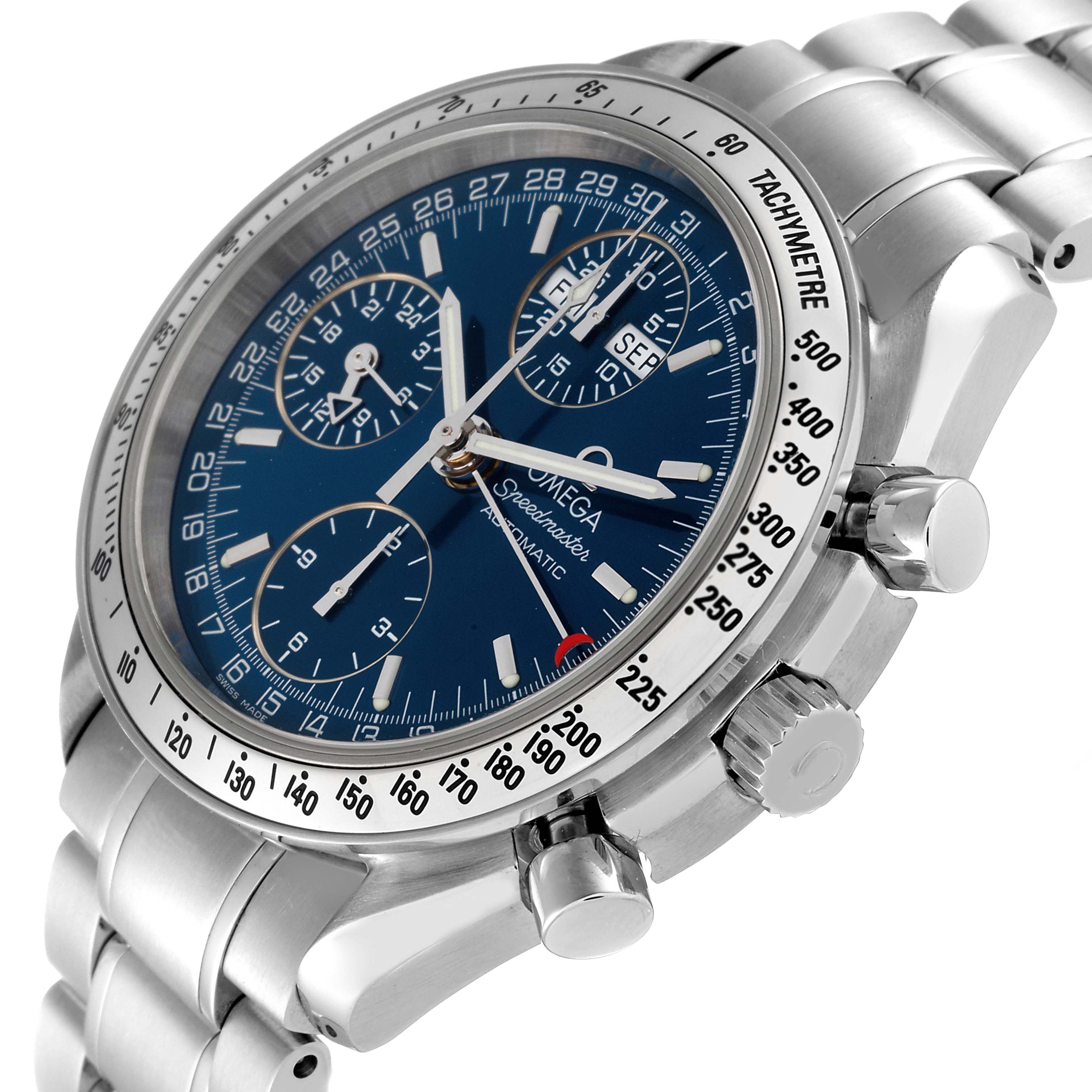 The image shows an Omega Speedmaster 3523.80.00 Men
s Stainless Steel Blue Dial 3523.80.00 Men
s Stainless Steel Blue Dial watch at an angle, revealing its blue dial, tachymetre bezel, and stainless steel bracelet.