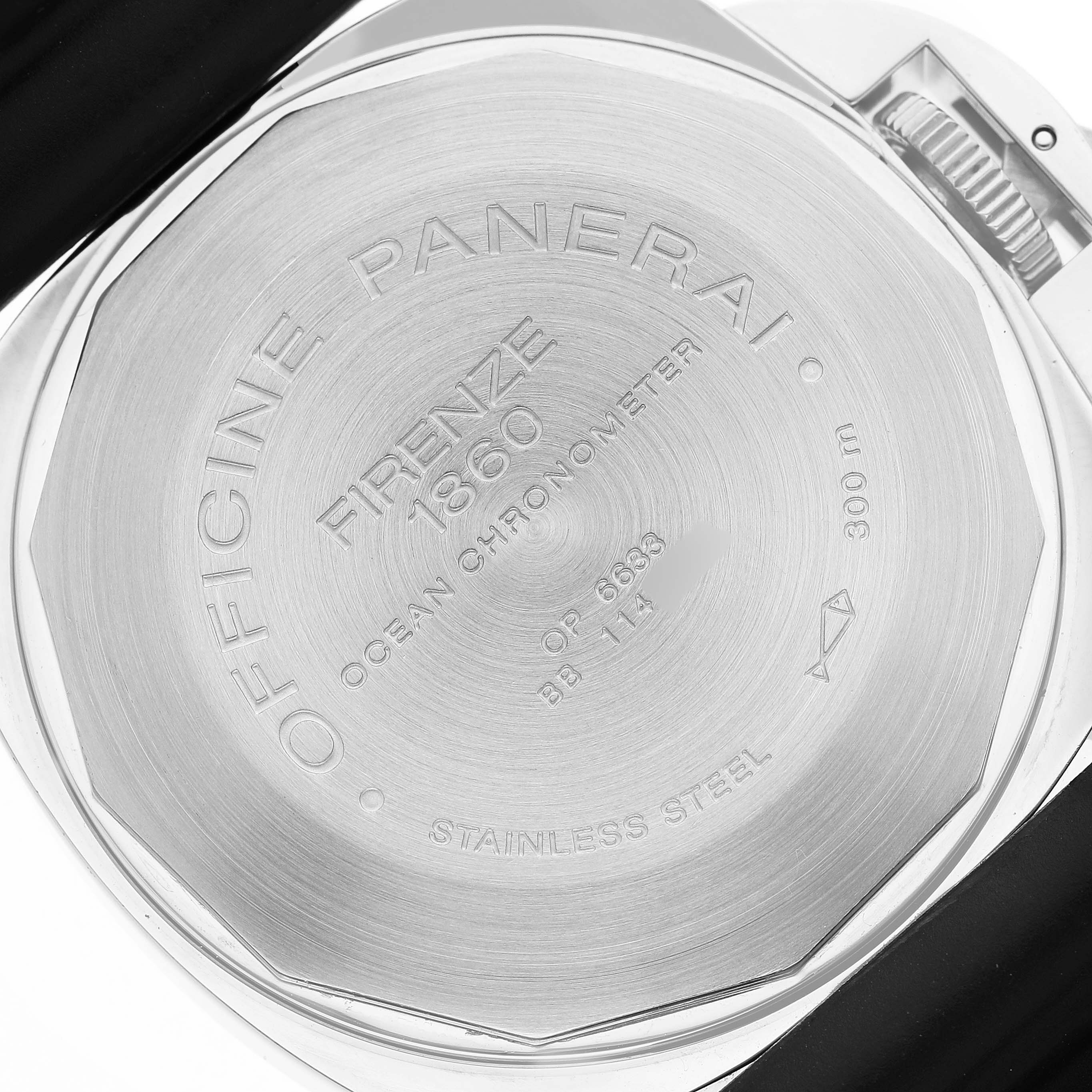 The image shows the stainless steel case back of a Panerai Luminor PAM00088 Men's Stainless Steel Black Dial, displaying engravings and a partial view of the crown.