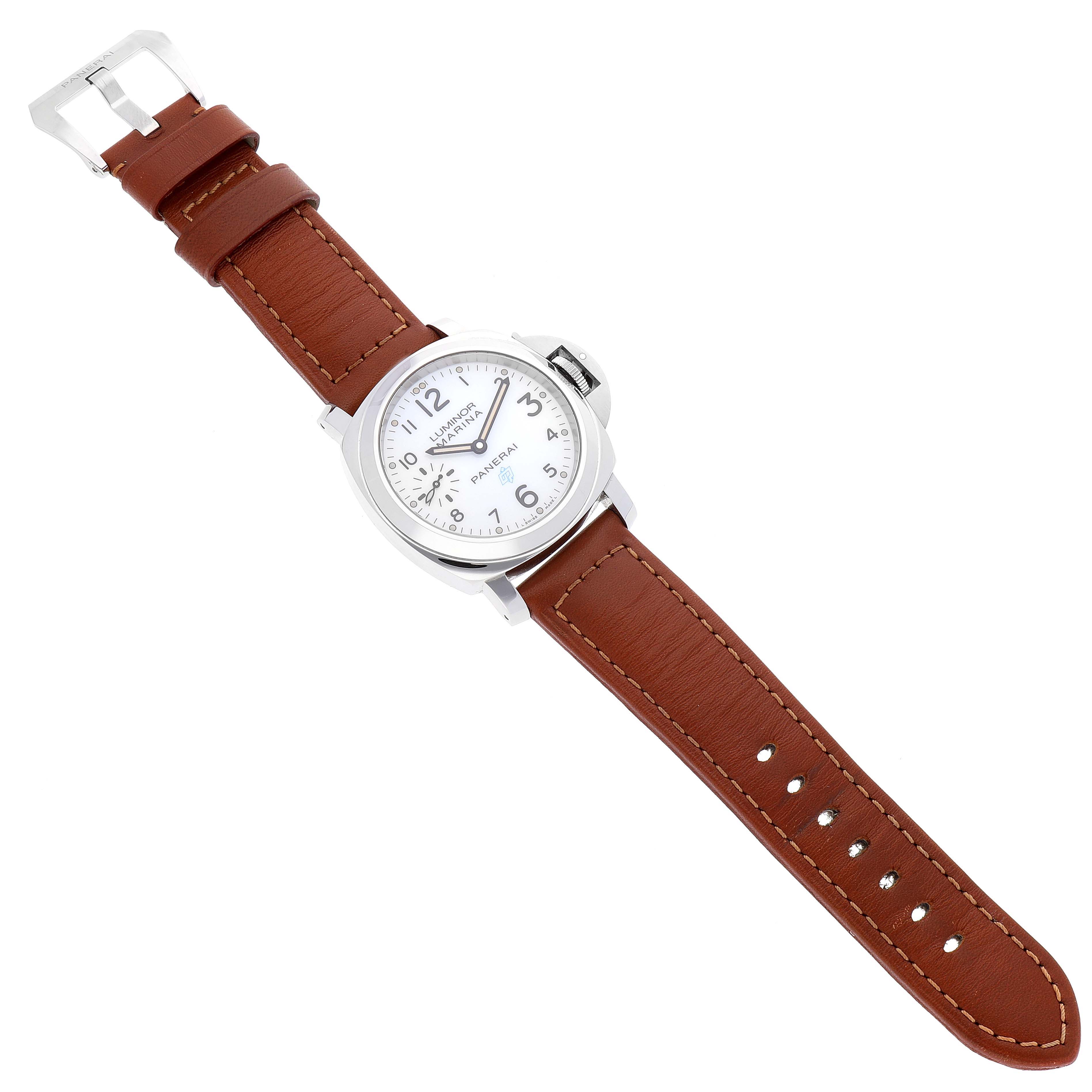 The Panerai Luminor PAM00660 Men
s Stainless Steel White Dial PAM00660 Men
s Stainless Steel White Dial watch is shown from a top-down angle, with its brown leather strap and white dial fully visible.