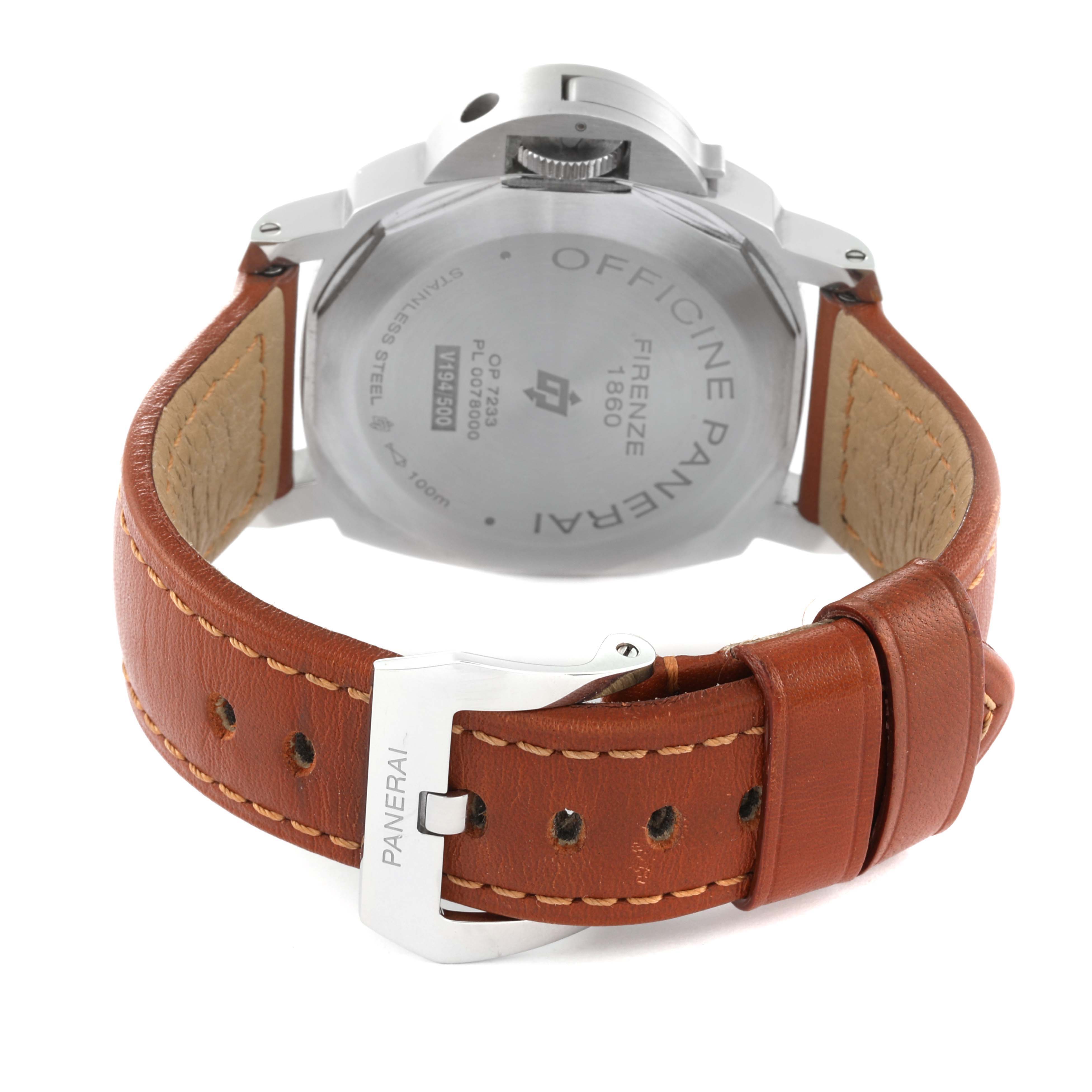 The image shows the back and clasp of the Panerai Luminor PAM00660 Men
s Stainless Steel White Dial PAM00660 Men
s Stainless Steel White Dial watch, highlighting the leather strap and engraved stainless steel case back.