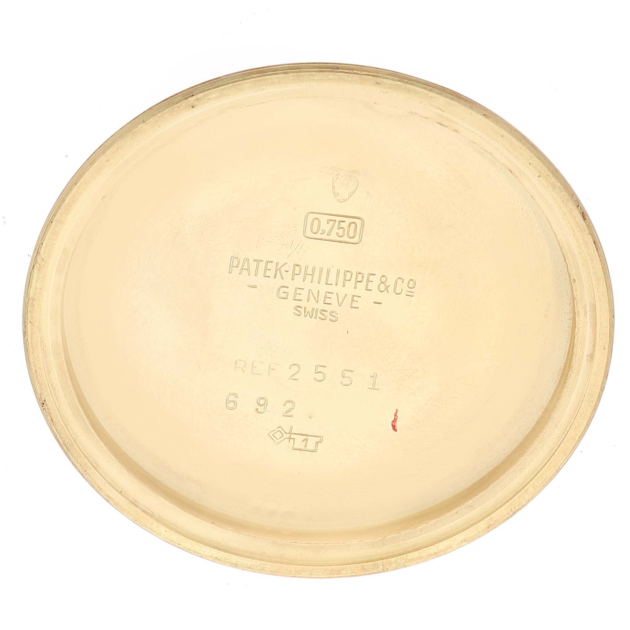 This image shows the interior of a Vintage Patek Philippe watch case back, model ref 2551.