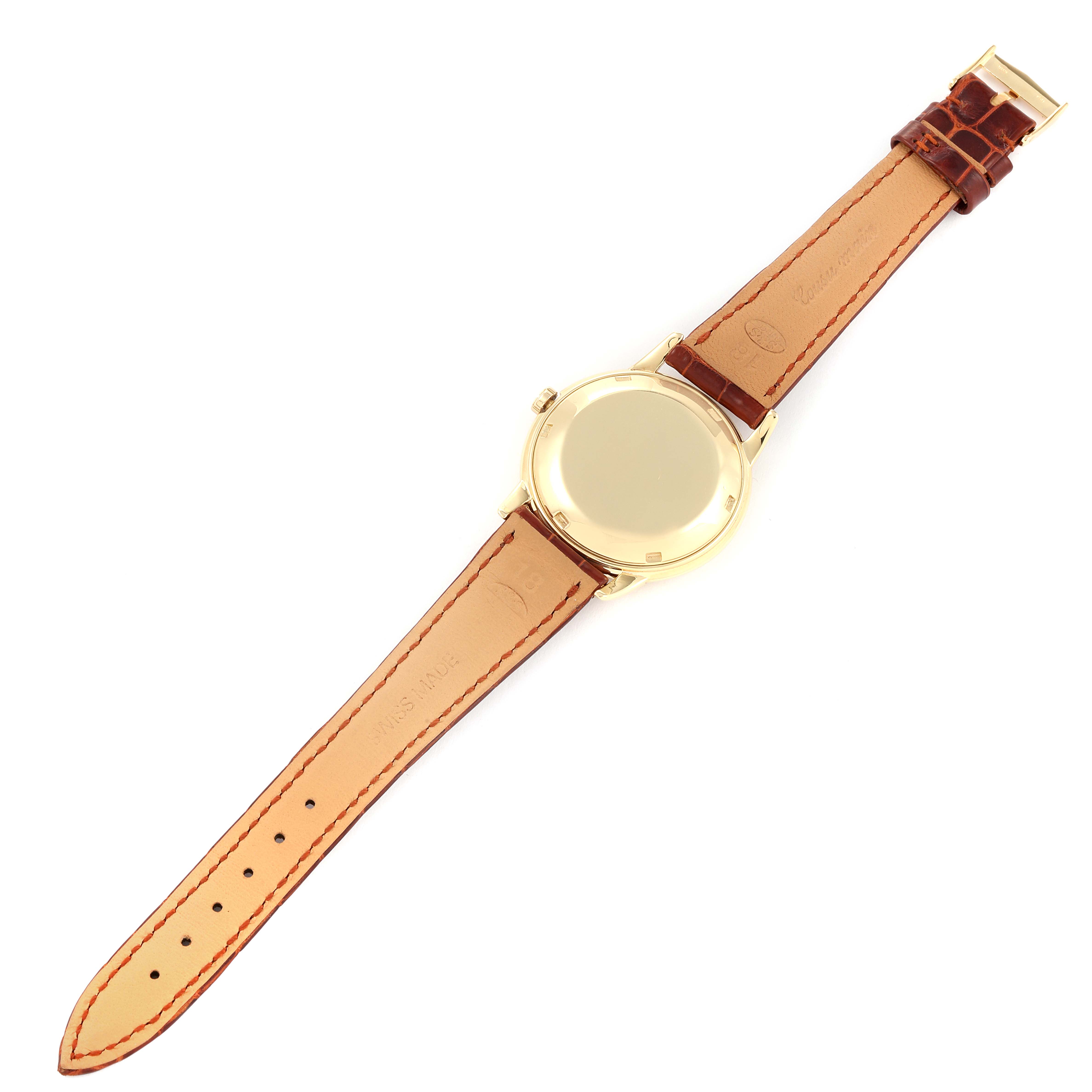 This is a top-down view of the back and leather strap of a Vintage Patek Philippe watch.