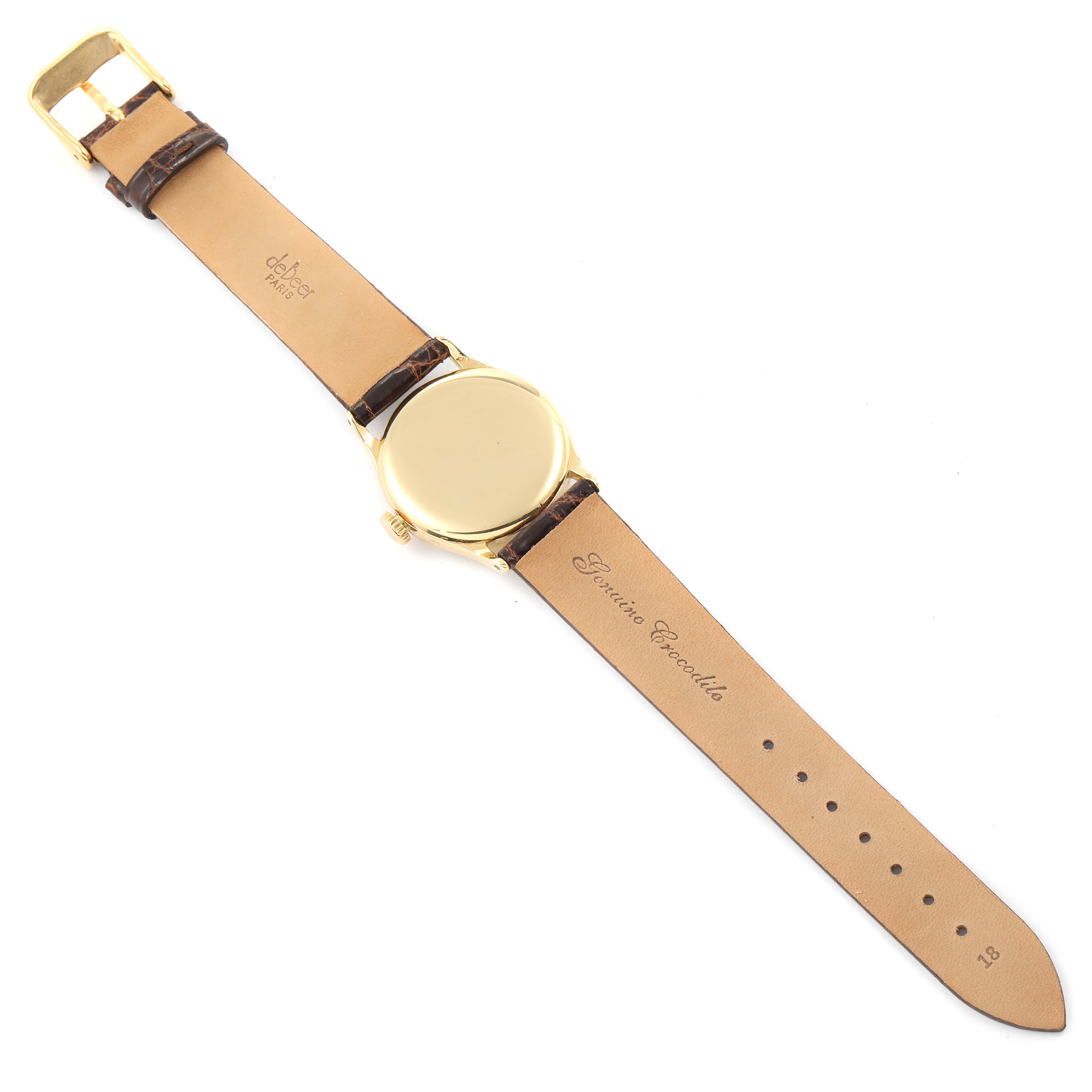 This image shows the back view of a Vintage Patek Philippe watch, revealing its leather strap and clasp.