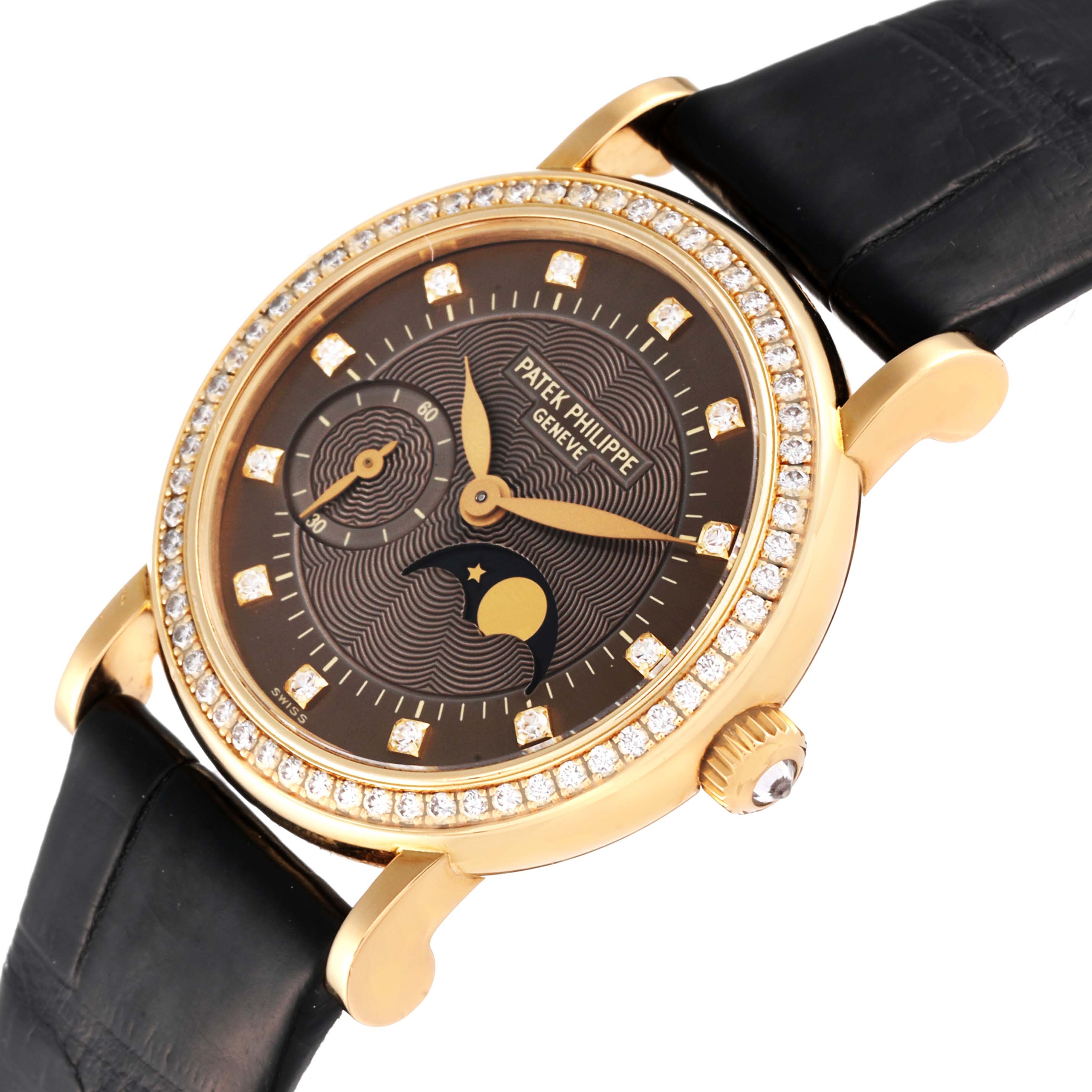 The Patek Philippe Calatrava 4858J - 010 Women's Yellow Gold Brown Dial 4858J - 010 Women's Yellow Gold Brown Dial is shown at a slight angle, highlighting the dial, case, and leather strap.