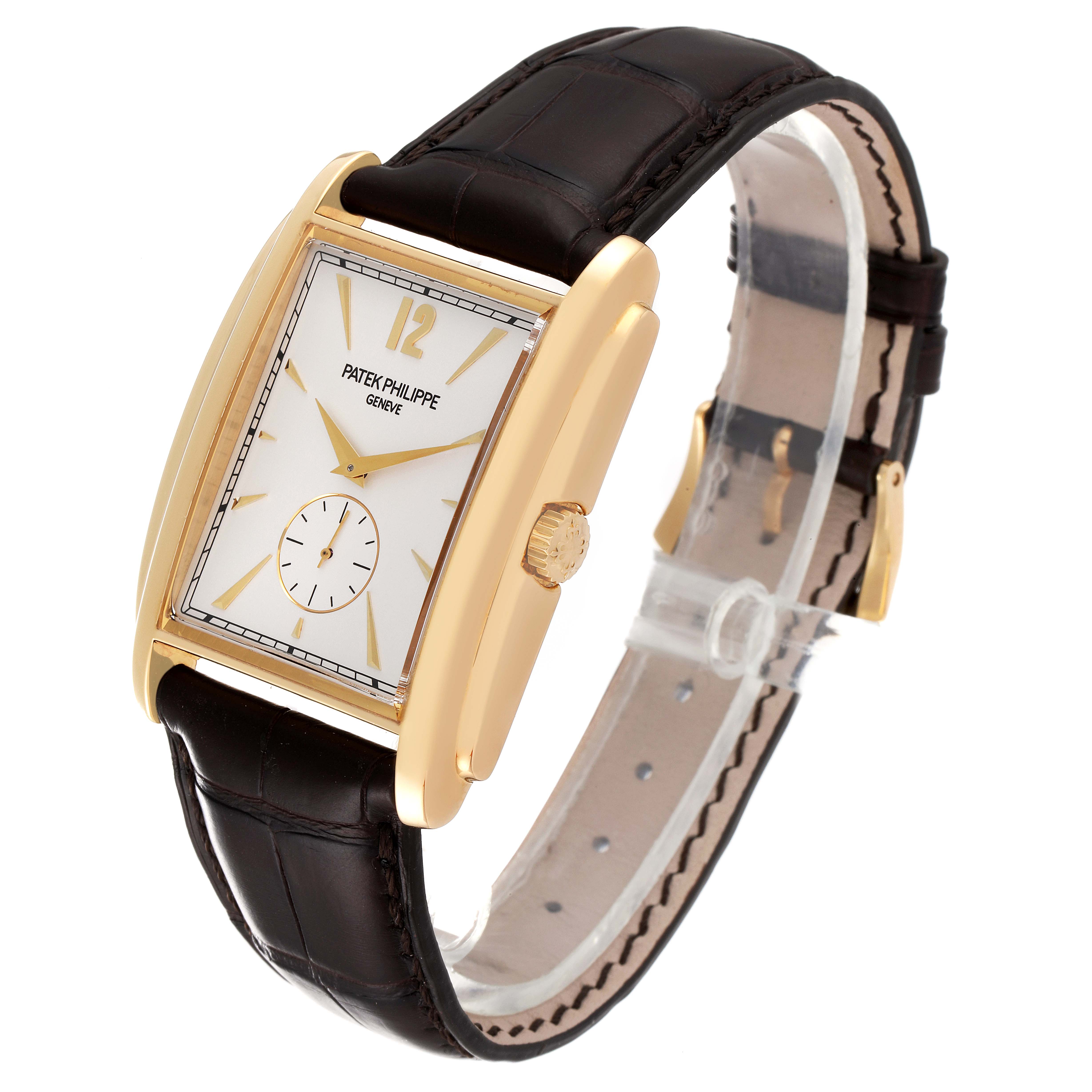 The image shows a Patek Philippe Gondolo 5124J Men's Yellow Gold Silver Dial 5124J Men's Yellow Gold Silver Dial watch at a three-quarter angle, highlighting its gold case, white dial, and black leather strap.