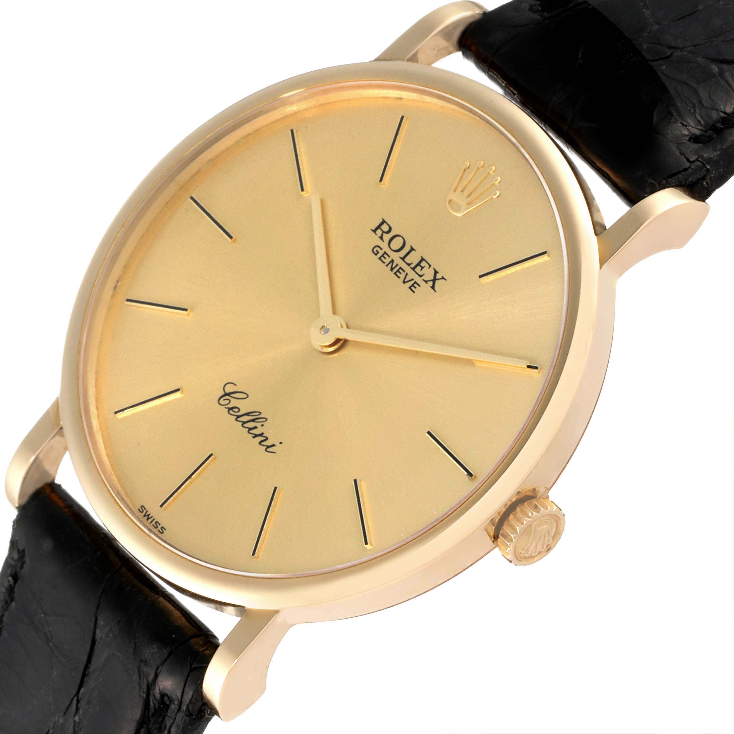 The Rolex Cellini 5112 Men's Yellow Gold Champagne Dial 5112 Men's Yellow Gold Champagne Dial watch is shown at a slight angle, displaying its gold dial, crown, and black leather strap.