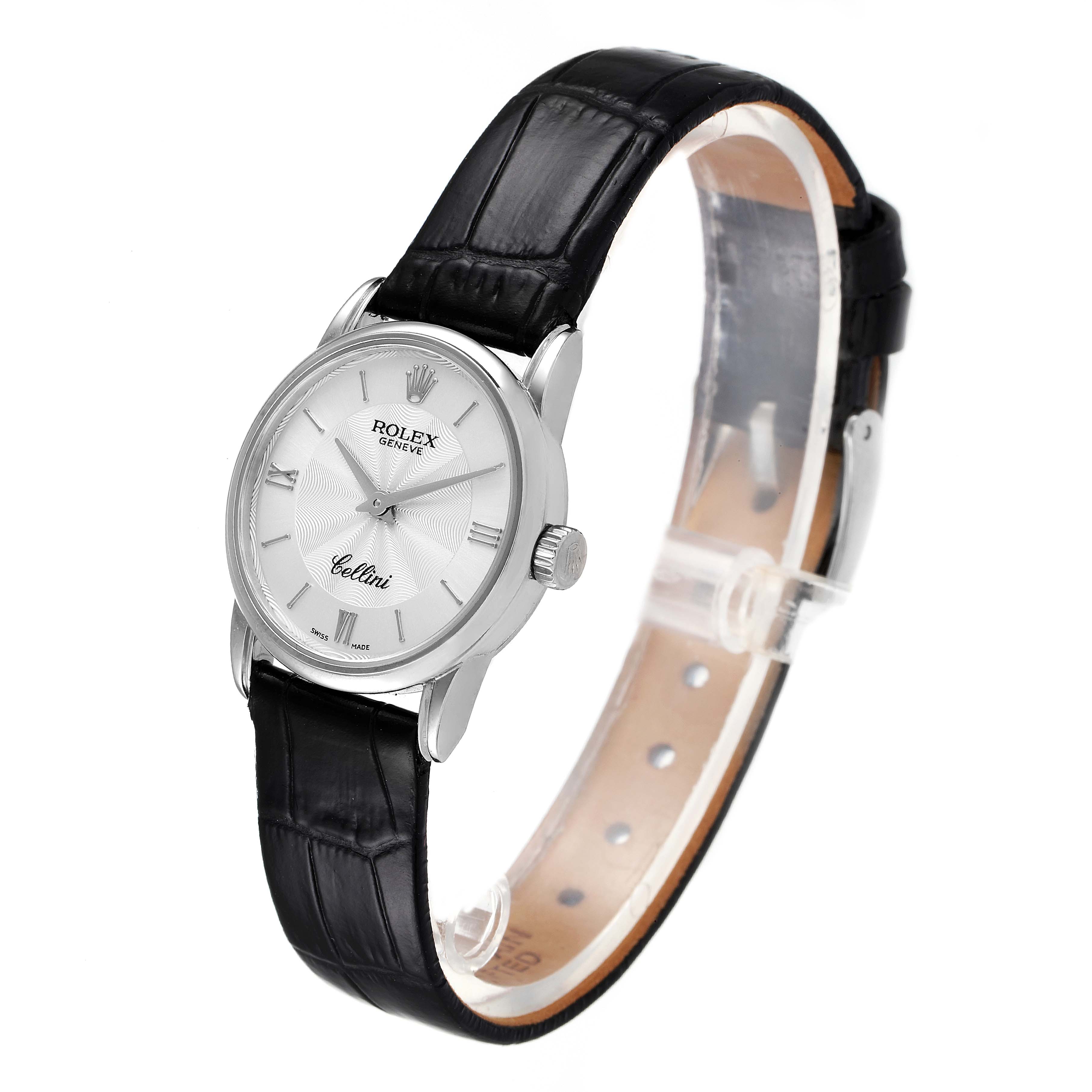 The image shows a side-angle view of a Rolex Cellini 6111 Women's White Gold Silver Dial 6111 Women's White Gold Silver Dial watch, highlighting its black leather strap and silver dial.