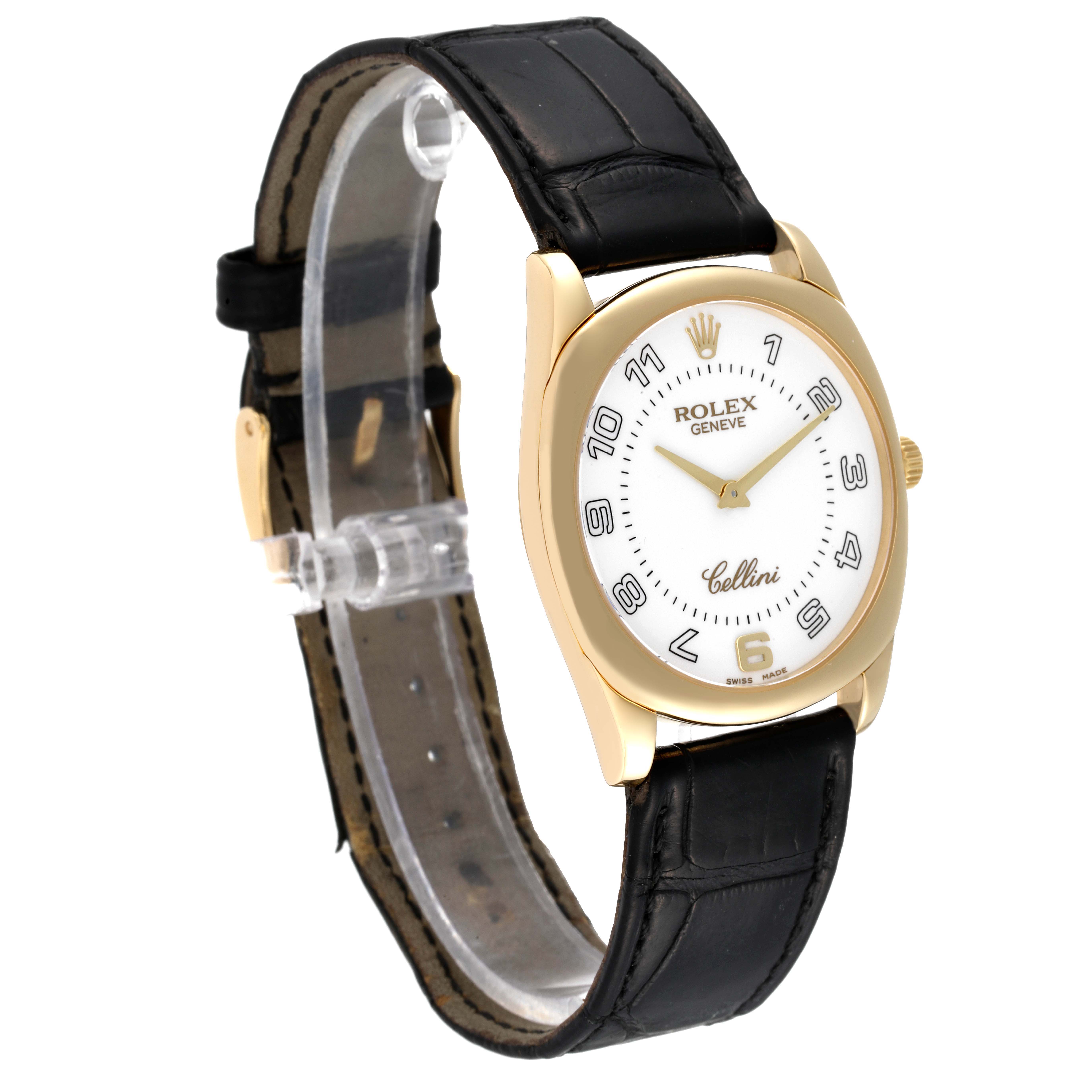 This Rolex Cellini 4233 Men's Yellow Gold White Dial 4233 Men's Yellow Gold White Dial watch is shown from a slight angled perspective, displaying its face, gold case, and black leather strap.