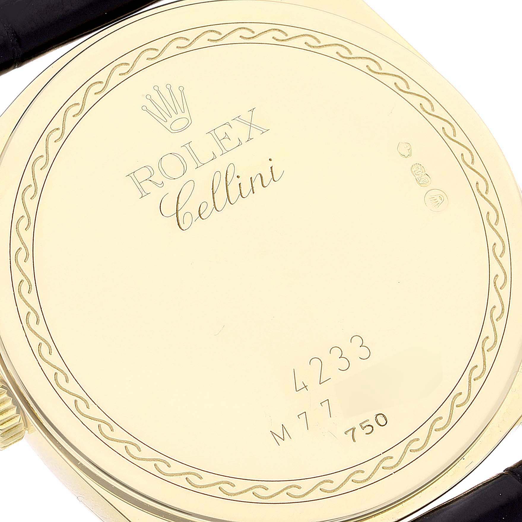 The image shows the back case of a Rolex Cellini 4233 Men's Yellow Gold White Dial 4233 Men's Yellow Gold White Dial watch, engraved with the brand name, model name, and serial numbers.