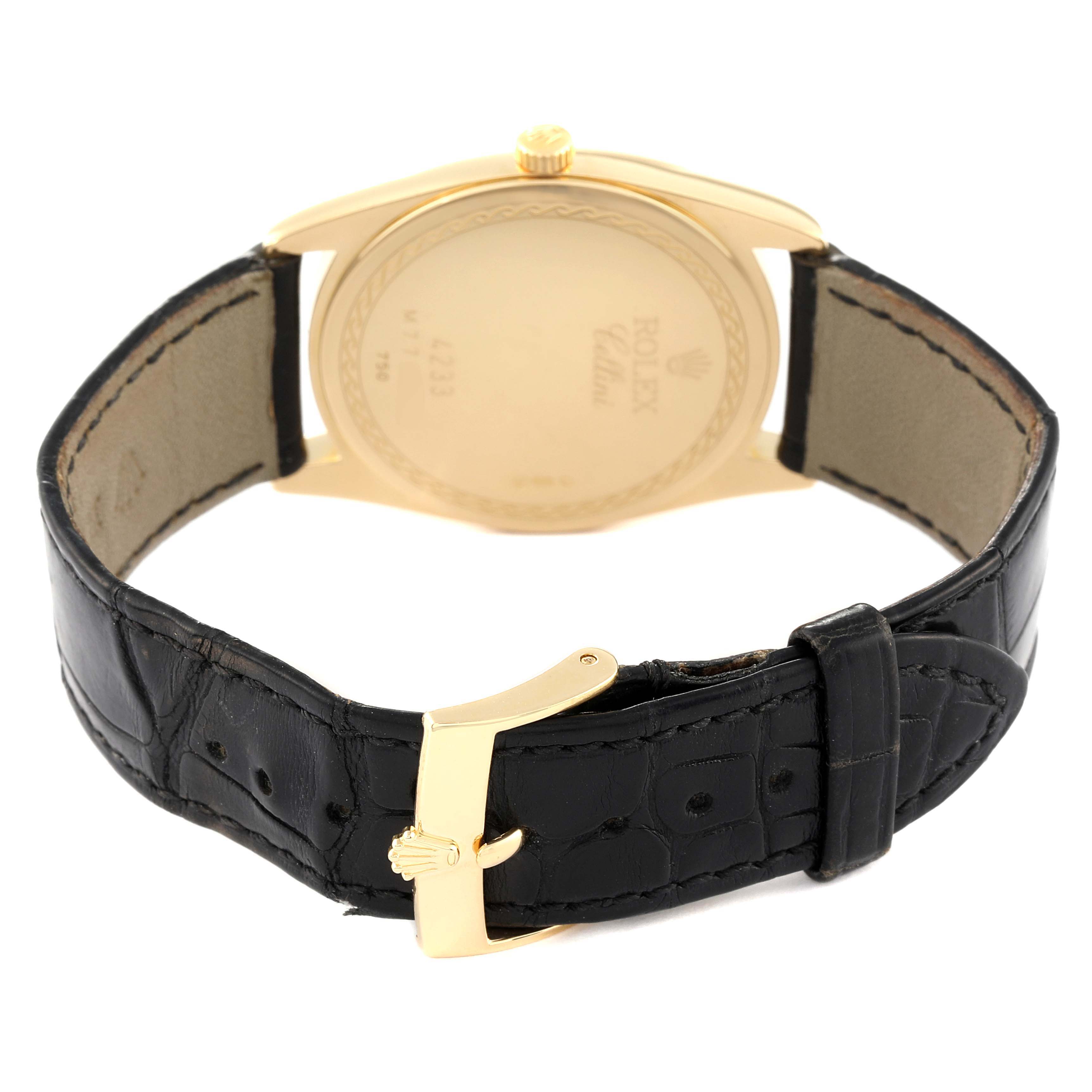 The image shows the back view of a Rolex Cellini 4233 Men's Yellow Gold White Dial 4233 Men's Yellow Gold White Dial watch, highlighting its leather strap and gold buckle.