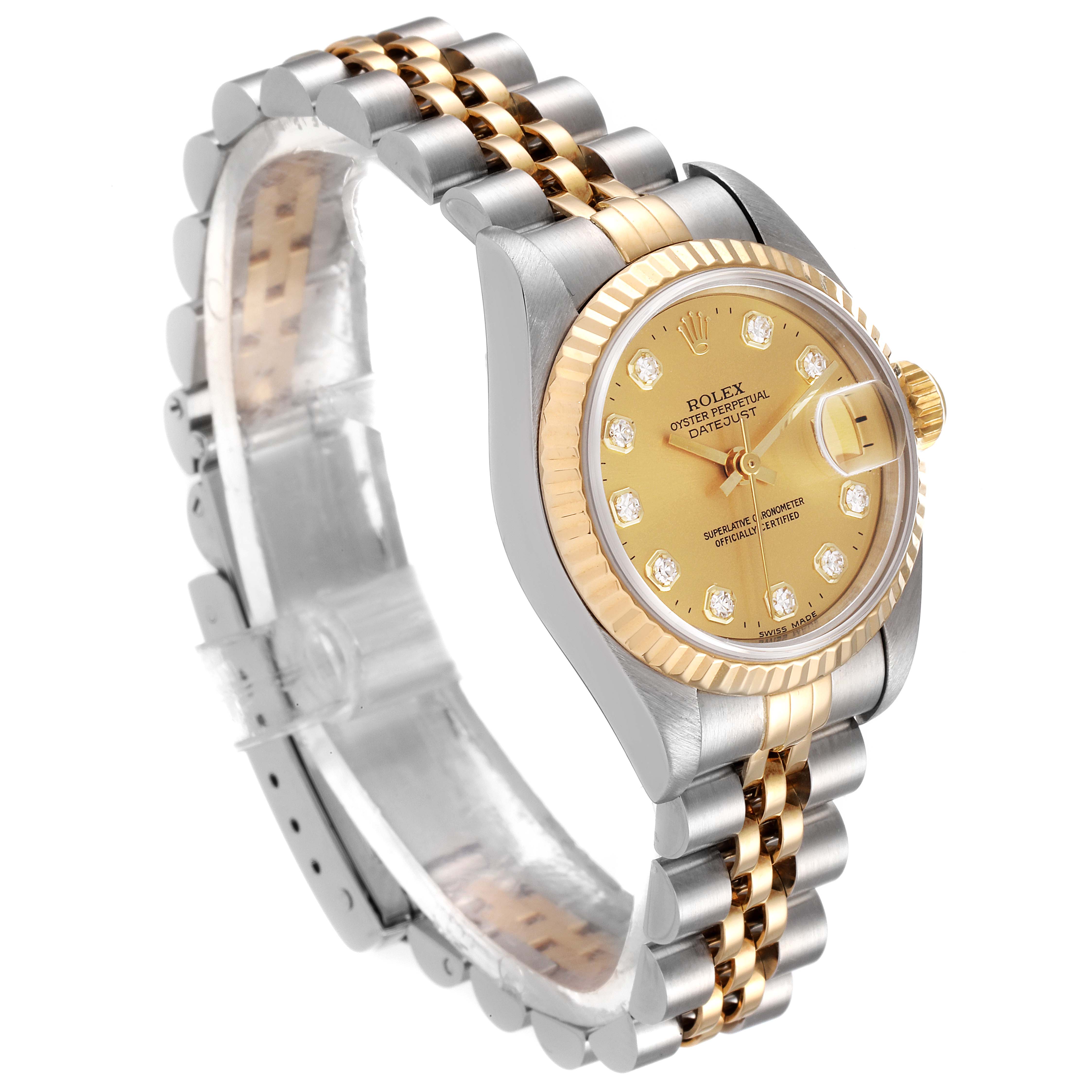 The Rolex Datejust 69173 Women
s Steel and Gold (two tone) Champagne Dial 69173 Women
s Steel and Gold (two tone) Champagne Dial watch is shown from a three-quarter angle, highlighting its dial, fluted bezel, and two-tone Jubilee bracelet.