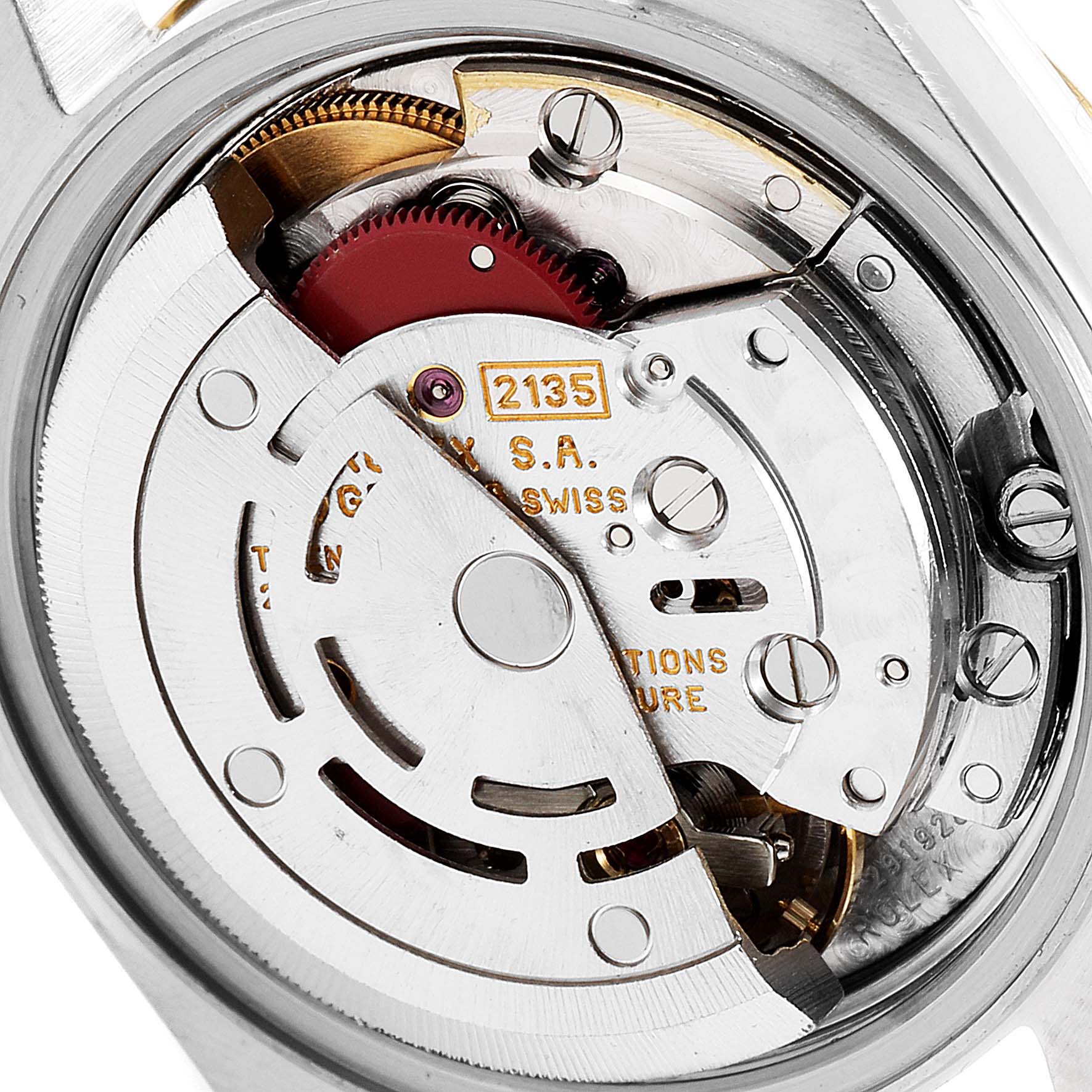 This image shows an angled view of the movement mechanism inside the Rolex Datejust 69173 Women
s Steel and Gold (two tone) Champagne Dial 69173 Women
s Steel and Gold (two tone) Champagne Dial watch model.