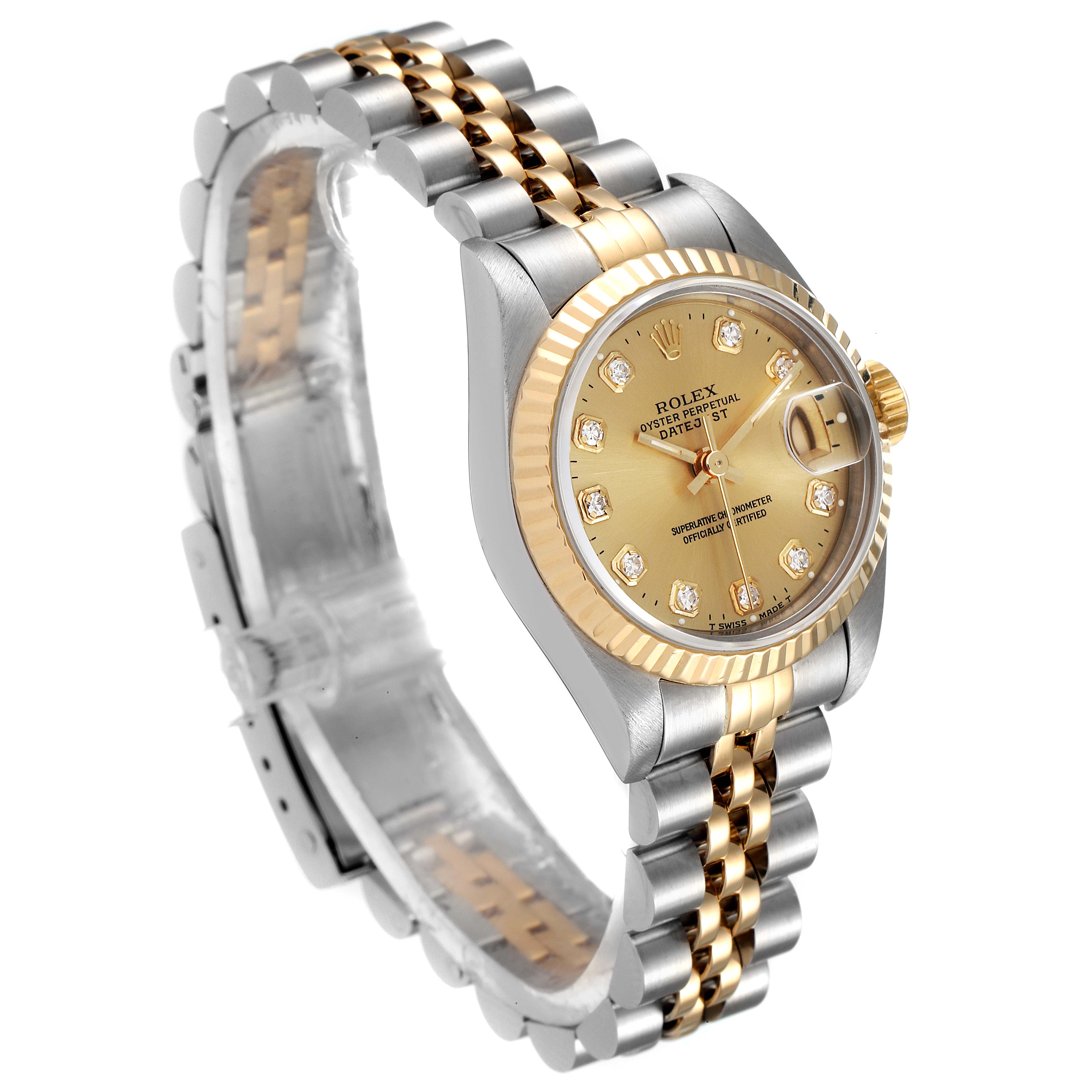 The Rolex Datejust 69173 Women
s Steel and Gold (two tone) Champagne Dial 69173 Women
s Steel and Gold (two tone) Champagne Dial watch is shown at a slight angle, displaying the face, bezel, and two-tone bracelet.