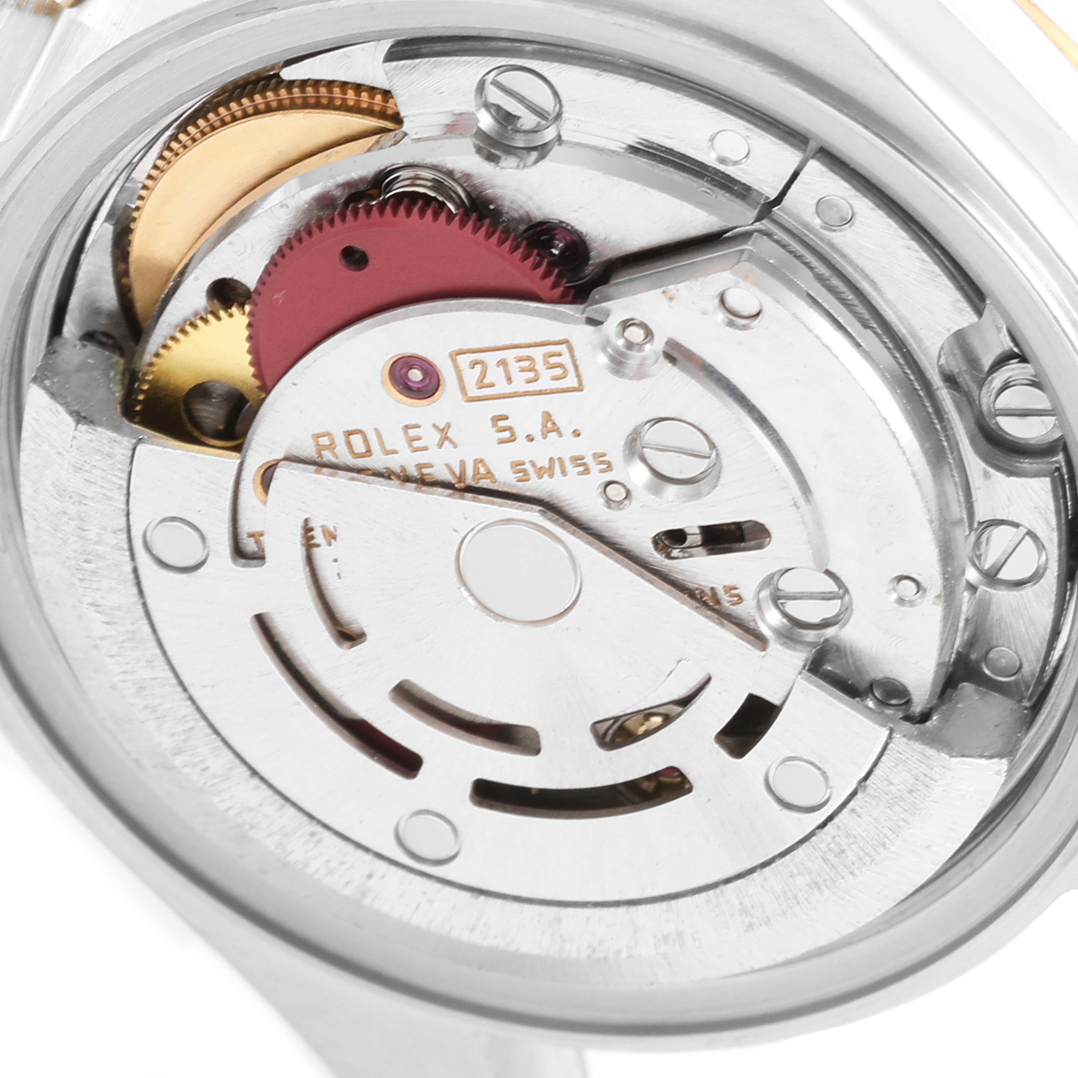 This image shows the internal mechanism of a Rolex Datejust 69173 Women
s Steel and Gold (two tone) Champagne Dial 69173 Women
s Steel and Gold (two tone) Champagne Dial watch, focusing on the automatic movement parts.
