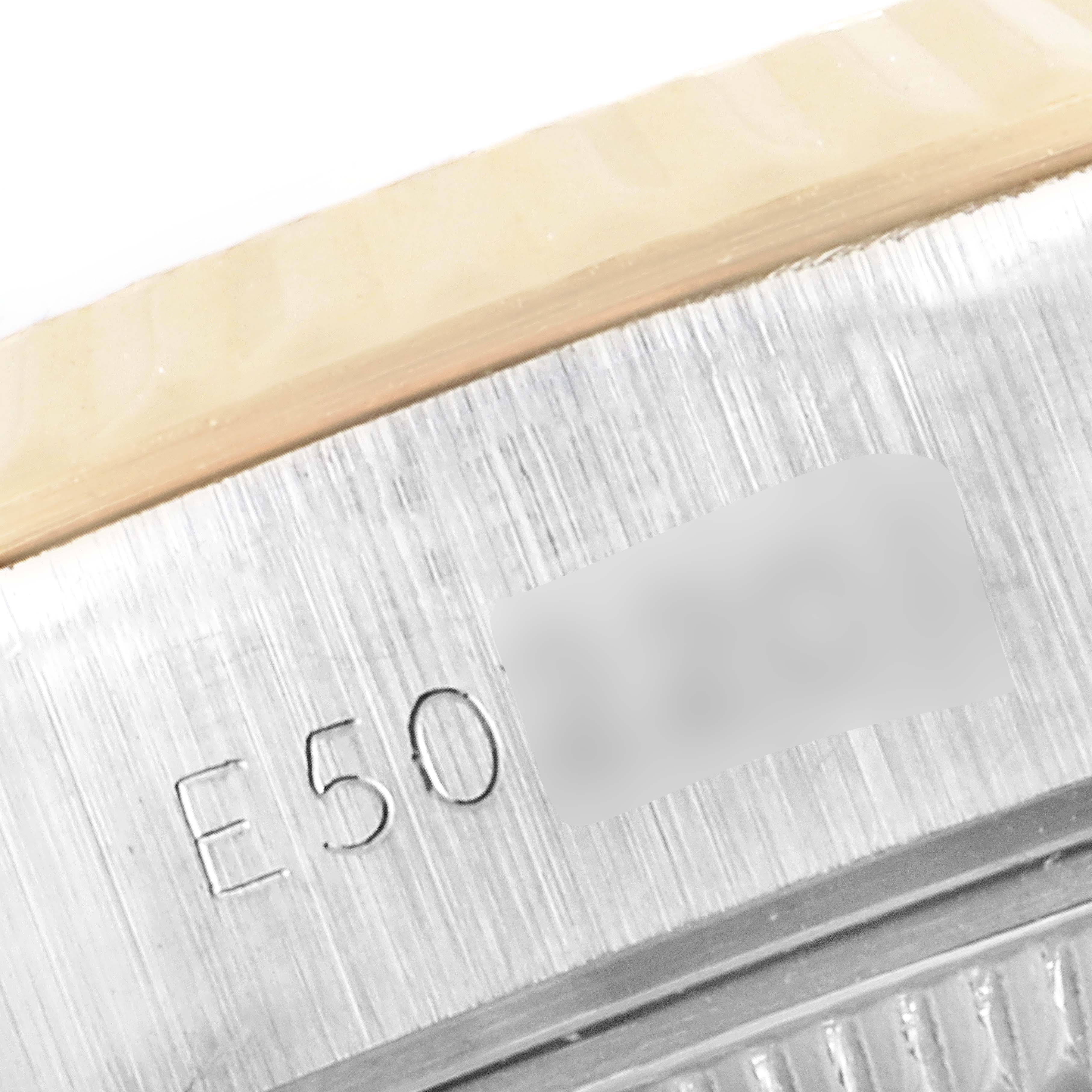 This image shows a close-up of the serial number engraving on the case of a Rolex Datejust 69173 Women
s Steel and Gold (two tone) Champagne Dial 69173 Women
s Steel and Gold (two tone) Champagne Dial watch.