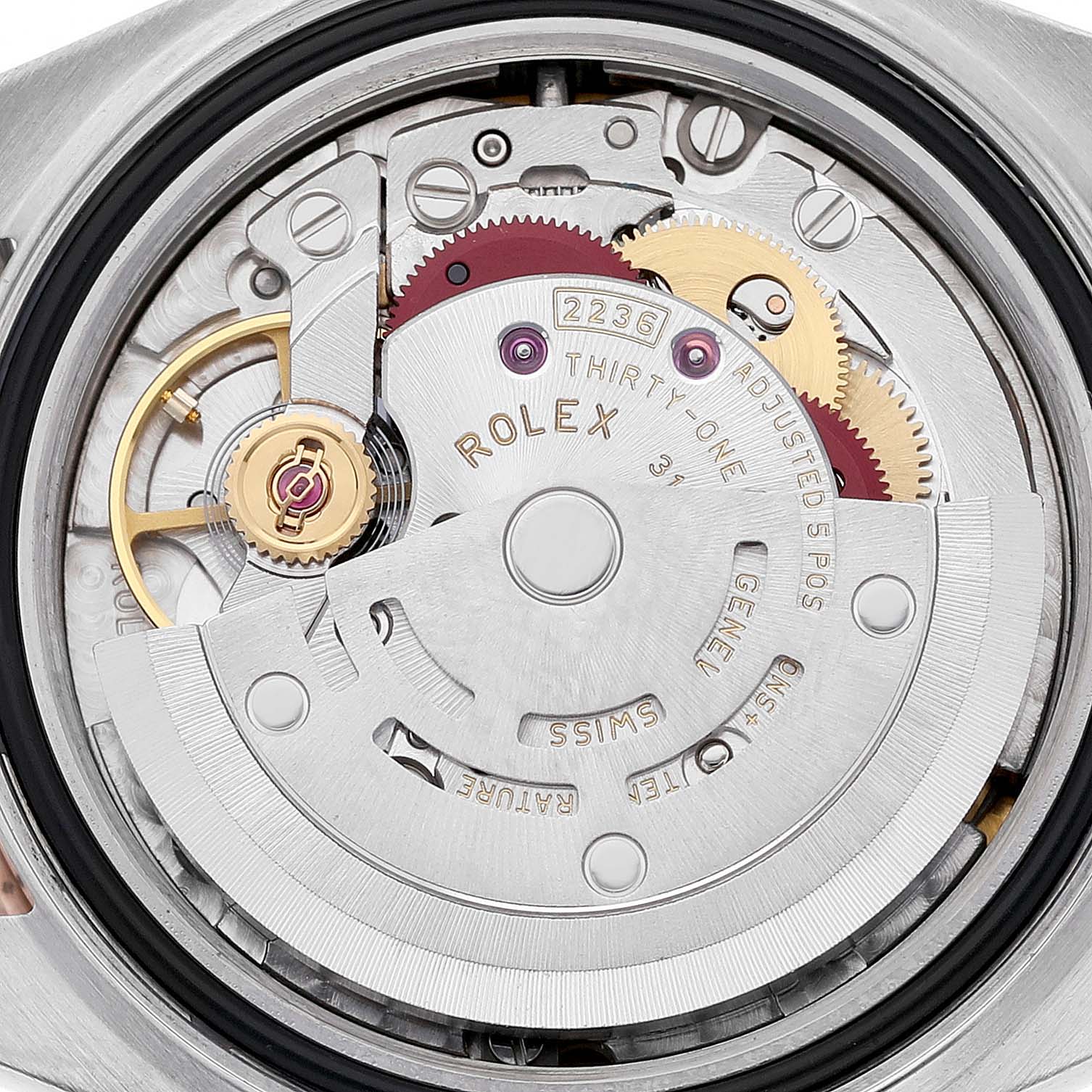 The image shows the movement of a Rolex Datejust 279381 Women's Stainless Steel Brown Dial watch from the back, highlighting gears and the rotor.