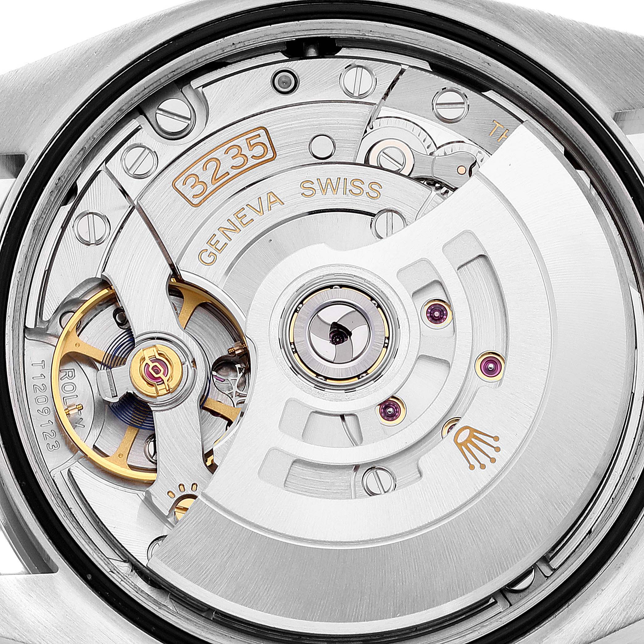 The image shows the internal mechanism and movement of a Rolex Datejust 126200 Men's Stainless Steel Black Dial 126200 Men's Stainless Steel Black Dial watch, focusing on the model 3235.