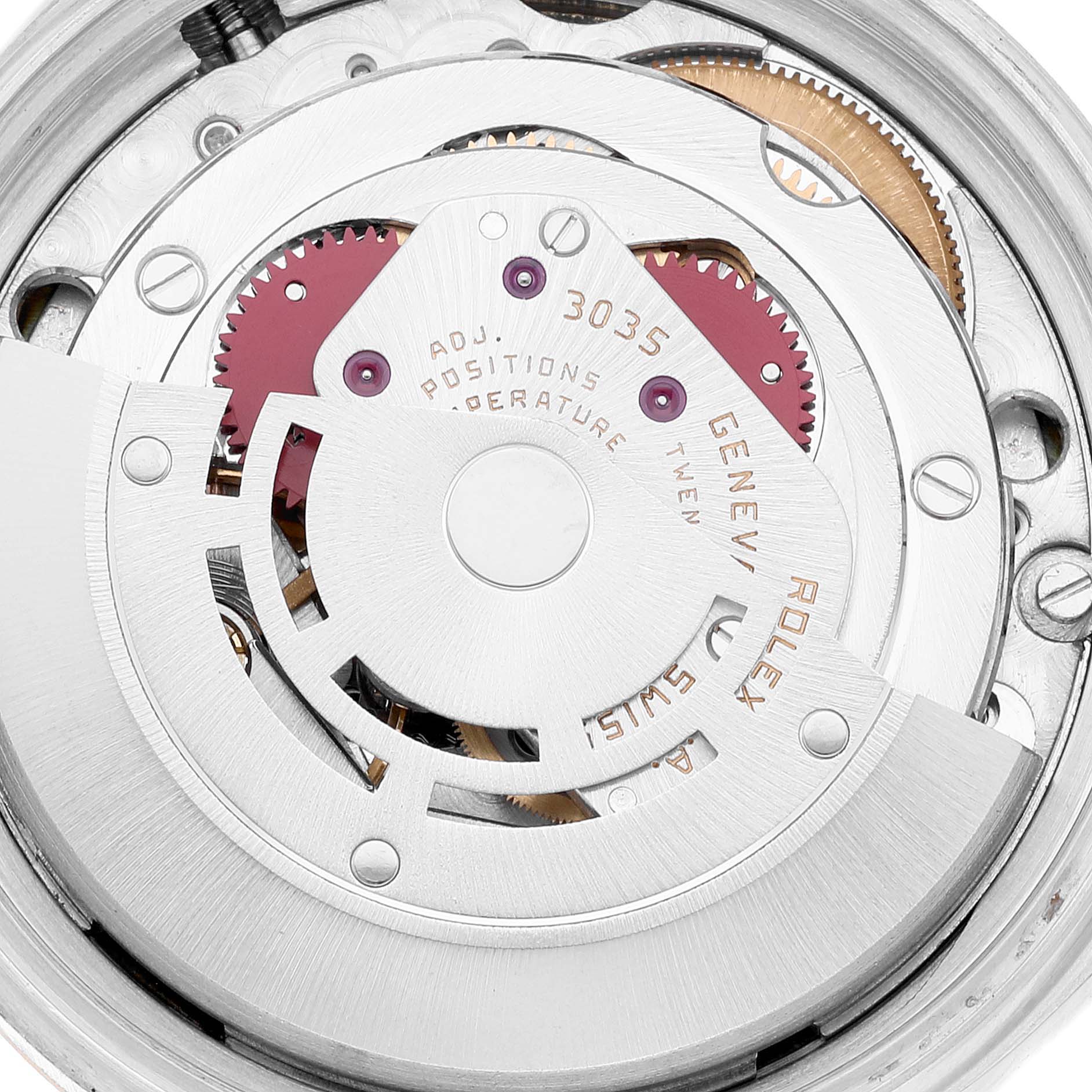 This image shows an internal mechanism of the Rolex Vintage Collection 16013 Men's Steel and Gold (two tone) Champagne Dial 16013 Men's Steel and Gold (two tone) Champagne Dial model from a close-up angle revealing gears and engravings.