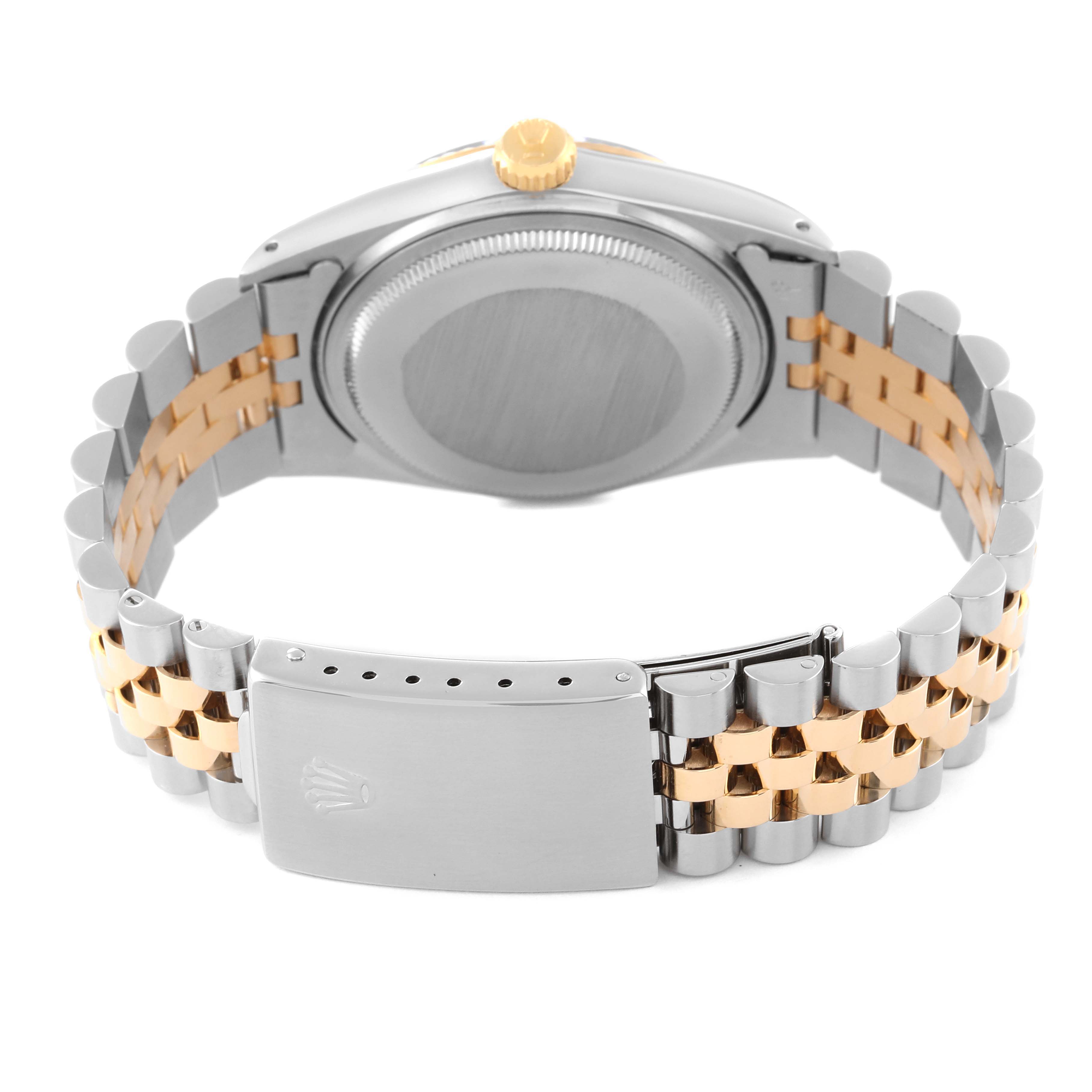 The image shows the back case and the two-tone metal bracelet with the clasp of the Rolex Vintage Collection 16013 Men's Steel and Gold (two tone) Champagne Dial 16013 Men's Steel and Gold (two tone) Champagne Dial model watch.