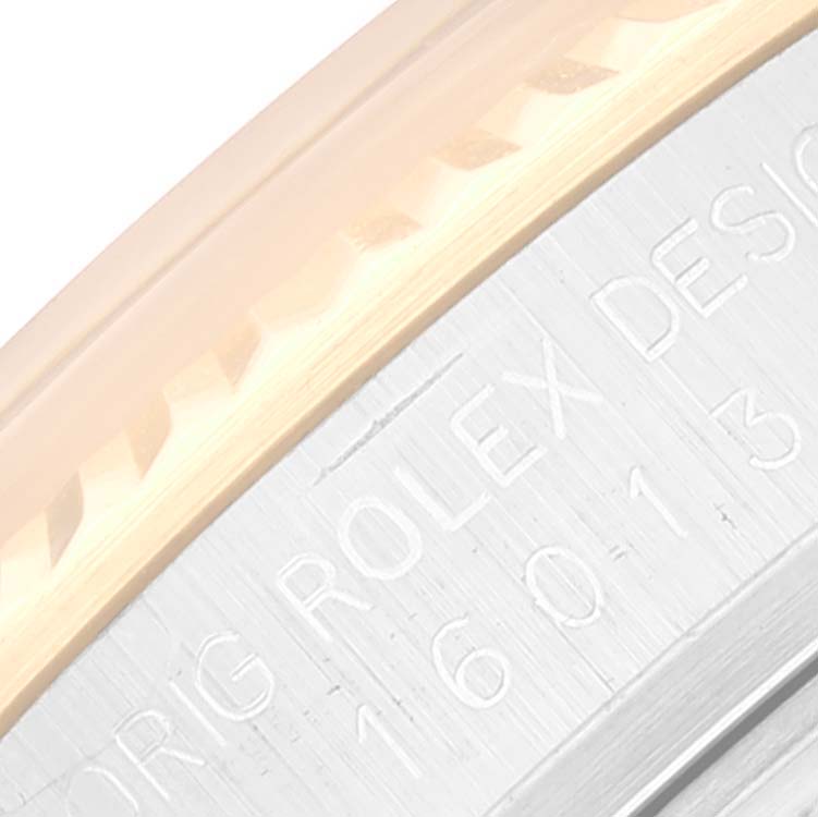 Close-up angle of the model number engraving on the case of the Rolex Vintage Collection 16013 Men's Steel and Gold (two tone) Champagne Dial 16013 Men's Steel and Gold (two tone) Champagne Dial watch.